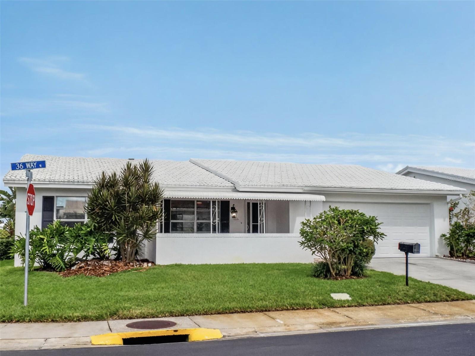 One or more photo(s) has been virtually staged. Welcome to 9255 36th Way N in Pinellas Park! This beautifully updated 2-bedroom, 2-bathroom home is located in the desirable Mainlands of Tamarac. This spacious residence features two living and two dining spaces, providing plenty of room for entertaining and everyday living. The versatile bonus room can be used as a home office, mud room, or hobby space, offering flexibility to suit your lifestyle. Each bedroom features its own private bathroom, providing comfort and convenience for you and your guests. The master bedroom also includes a spacious walk-in closet. You'll also find brand-new kitchen and bathrooms, along with fresh interior paint, new flooring, and updated lighting fixtures throughout. The home also includes a two-car garage for added convenience and storage. Mainlands Unit 6 is an active 55+ community with wonderful amenities, including a clubhouse, heated in-ground pool, shuffleboard courts, and a golf course, as well as a calendar full of activities. Unit 6 welcomes 2 pets and is located close to the clubhouse and pool. The monthly maintenance fee of $395 covers lawn care and irrigation maintenance, exterior painting and pressure washing, water, sewer, trash, internet, and cable - making this the perfect low-maintenance lifestyle. Schedule your showing today and make this house, home!

Some photos in this listing have been virtually staged to help illustrate the property’s potential. No physical changes have been made to the property.