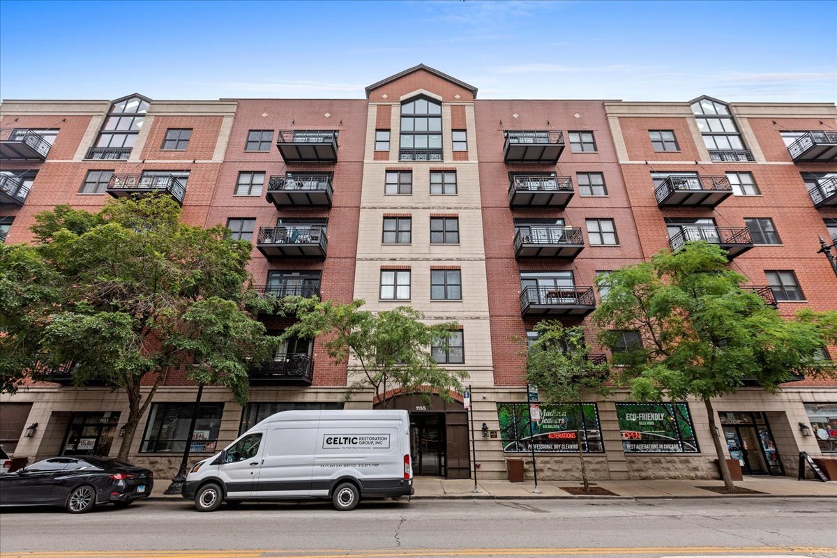 Welcome to this sunny, spacious penthouse unit in an elevator building in the West Loop with an open floor plan, 3 bedrooms + an office/den, 2 full bathrooms and 2 balconies! This top-floor unit has everything you need for spacious living including a gorgeous office/den with 2 story floor-to-ceiling windows giving you tons of natural light, and one attached deeded garage parking space included in the price. The open kitchen has stainless steel appliances, separate pantry and a huge island with seating. There is a large dedicated area for a dining table and ample room for a large couch and seating area with fireplace. The primary bedroom easily fits a king bed and has a large walk-in closet, and an en-suite primary bathroom with a soaking tub, separate shower and dual vanity. The 2nd bedroom fits a queen bed with room to spare. The 3rd br is lofted and works great for a small guest room, nursery, exercise space or 2nd office. In the heart of the West Loop, the location is superb with Fulton Market and Randolph Street shopping and restaurants close-by and easy access to both the 290 and 55 expressways and public transportation.