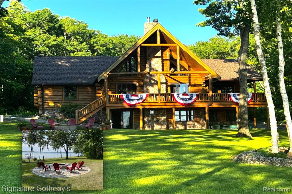 A grand welcome-meet craftsmanship where every detail tells a story and where lakeside living is elevated to an art form.  As you wind down the 975 ft paved tree lined driveway, the vision unfolds of a one-of-a-kind log custom built  masterpiece.  It's rich Michigan-Native timber milled onsite with a detached 2 story 3-car garage, with plenty of storage for your vehicles, equipment and lake-life essentials . Upon entering a kitchen, worthy of a chef, with new custom cherry kitchen, granite countertops, massive center island and dual sided storage.  Including built in Microwave drawer, French door SS Refrig., wine refrig.,48" SS Wolf range, double ovens, griddle, grill  and Zephyr range hood.  A 2-story Great room with floor to ceiling stone gas fireplace. The wraparound deck offers breathtaking lake views from Great room with oversized door walls and windows.  Complete with vaulted ceiling in dining room.  Primary bedroom on first level with spa like ensuite bath  featuring oversized custom shower, cherry double vanity & Kohler fixtures.  Second level offers bright loft bedroom, hardwood floors, double closets, w/updated full bath.  Lower level fully refinished walk-out offers full kitchen, third bedroom in lower level w/fully updated new bath.  Additional large family room with custom wood beams w/floor to ceiling stone fireplace for entertaining. Also included large storage room.  Step outside this beautiful home and look upon 178 ft. of beautiful shoreline of all sports Grand Lake.  Seller is offering a new roll-in L shaped dock w/oversized sundeck.  Boat lift and snowmobile access offers all four seasons of enjoyment!  Custom 18ft. circular fieldstone patio and firepit .  New HVAC water softener, sump pump, updated electrical panels, and whole house Generac 24KW generator.  Nothing left to do but turn the key, step inside and let Pure Michigan life begin!!  All buyers to provide proof of funds. Min. 48 hrs. to show - listing agent must be present at all showings.  BATVAI