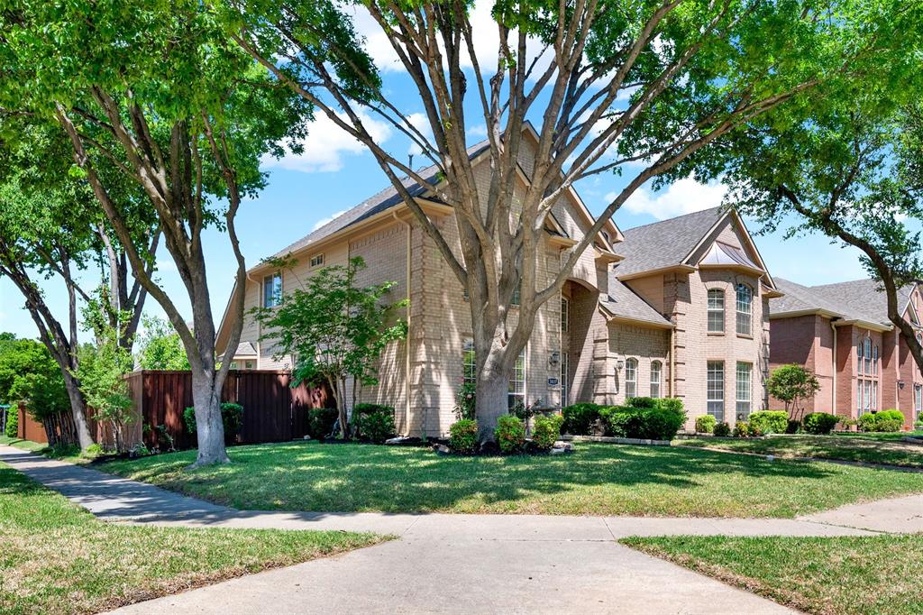 Exquisite Two-Story Corner Lot Home, Nestled Among Majestic Mature Trees! Brimming With Breathtaking Features, This Residence Boasts Elegant Wood Flooring On The Main Level, A Luxurious Master Suite With A Spacious Sitting Area And Bay Windows, And A Modern Kitchen Adorned With Stunning Granite Countertops And An Expansive Island. Enjoy The Convenience Of Built-Ins In The Family Room And Generous Patio Spaces Perfect For Outdoor Gatherings. Upstairs, You'll Find Soaring Ceilings And A Vast Game Room With Split Bedrooms. Don't Let This Move-In-Ready Gem Slip Away! Located In The Sought-After Estates Of Russell Creek Community, You'll Have Access To Two Community Pools, A Playground, A Sports Court, And Two Tennis Courts. Plus, You're Just Moments Away From 121, DNT, Stonebriar Mall, The Star Center, Legacy West, And More. Roof Completed In 2023. HVAC 2023. Water Heater 2021. New Stove Top And Dishwasher In 2023. Excellent Schools and More!