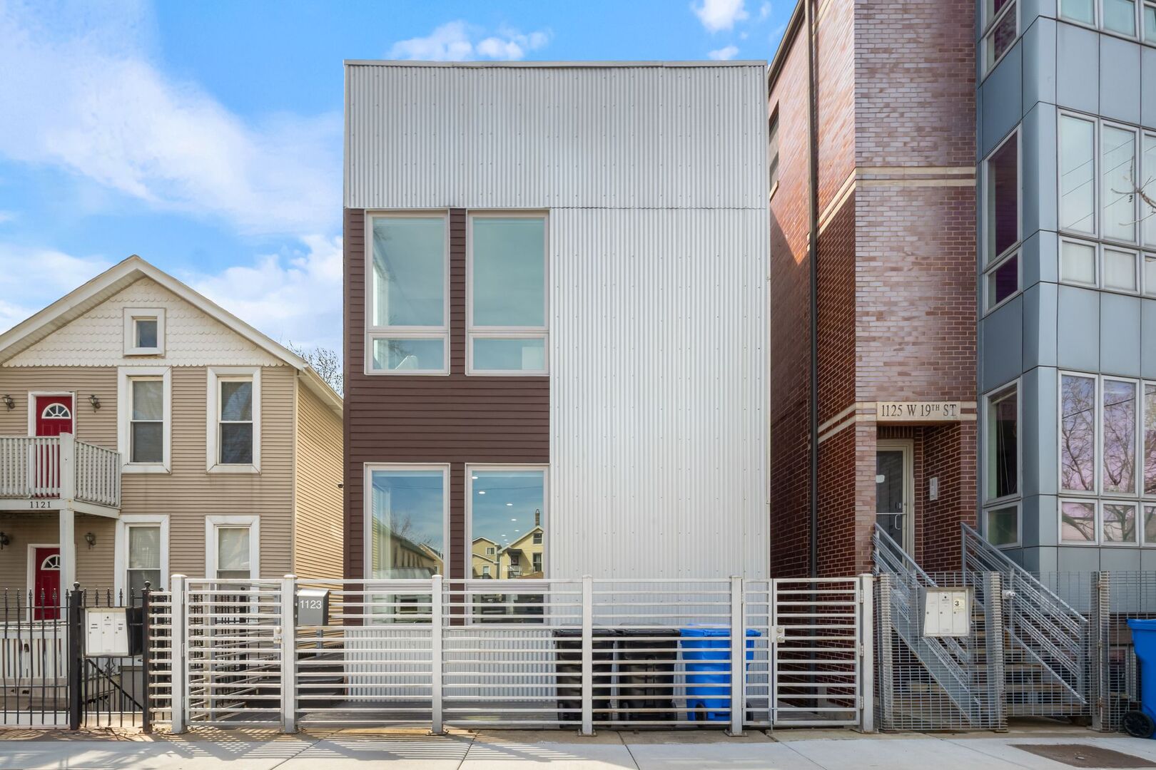 With nearly 3,000 sq ft of finished space, this oversized single-family rowhome offers the perfect blend of historic charm and modern versatility in one of Chicago's most vibrant neighborhoods. Thoughtfully laid out across four expansive levels, this home is ideal for individuals or couples who love to host. The open-concept main level invites gatherings with high ceilings, large windows, and hardwood floors flowing through the living and dining areas. The kitchen opens directly onto a spacious deck, perfect for summer dinners and weekend brunches.    The second floor features two spacious bedrooms, including a serene primary suite with high ceilings, a private balcony, and a spa-inspired en suite bathroom. The finished basement adds even more room to entertain or relax, with a large family room, a third bedroom, and flexible space ideal for a gym, home office, or guest quarters. Whether it's rooftop cocktails with friends or backyard cookouts, this home was designed for connection and celebration.    Zoned RS-3 with no HOA, no shared walls, and full ownership freedom-all just blocks from the energy of 18th Street and its award-winning restaurants, galleries, and nightlife