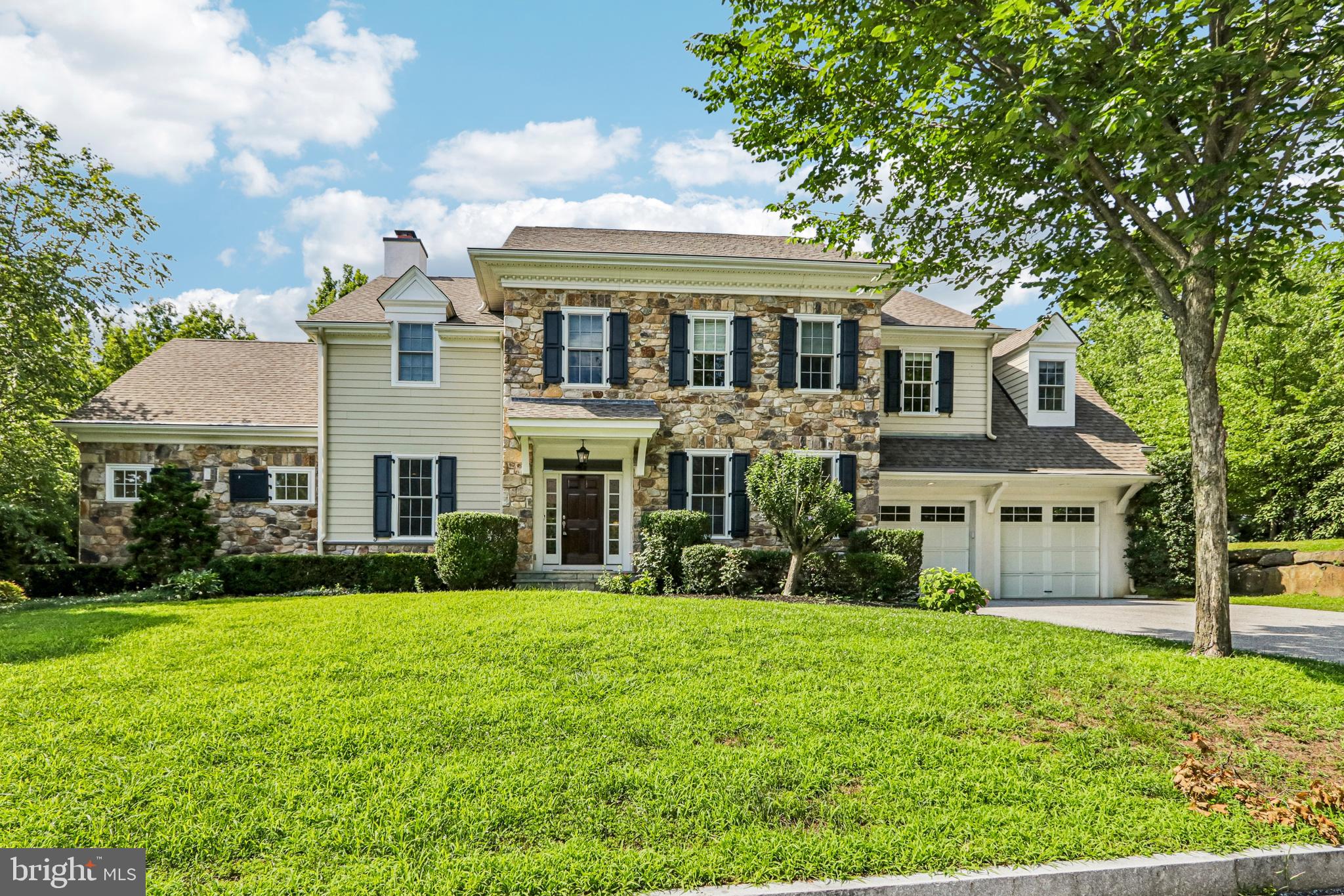 ⸻Exceptional Bryn Mawr–Radnor Township Walk-to-Town LivingWelcome to 100 Braebank Lane, an exceptional residence offering the perfect blend of sophisticated design, low-maintenance living, and an unbeatable Main Line location. Ideally situated in the desirable Radnor Walk community, this beautifully crafted Stone and Hardie® Plank home offers nearly 4,000 square feet of finished living space, thoughtfully designed for the today lifestyle. Built in 2014, this like-new residence combines timeless architectural details with modern conveniences, exceptional craftsmanship, and effortless comfort.A gracious entry welcomes you into a sun-filled, open-concept interior featuring a neutral designer palette, site-finished oak hardwood floors, 9-foot ceilings on the first and second floors, elegant two-piece crown molding, and custom built-in cabinetry. Andersen high-performance windows provide abundant natural light while enhancing energy efficiency and ease of maintenance. Two gas fireplaces in the cathedral ceiling family room and breakfast area add warmth and ambiance throughout the home.The heart of the residence is the stunning gourmet kitchen, complete with a spacious breakfast area and butler pantry. Designed for both everyday living and entertaining, the kitchen features custom 42-inch cabinetry, an oversized granite-topped island with seating, Sub-Zero refrigerator, Bosch double wall ovens, Bosch 5-burner gas cooktop, subway tile backsplash, Rohl Perrin & Rowe water filtration faucet, pantry storage, and premium finishes throughout. The kitchen flows seamlessly into the gathering spaces, creating an inviting environment for family and guests. Completing the main level are a stylish powder room, a functional mudroom with additional storage, and a convenient dry bar.The second level offers four spacious bedrooms, three full bathrooms, and a conveniently located laundry room. The luxurious primary suite serves as a private retreat with a tray ceiling, two custom-designed walk-in closets by California Closets, and a spa-inspired bathroom featuring a soaking tub, oversized walk-in shower, and dual vanities with granite countertops. Each additional bedroom, one ensuite,  offers generous closet space, comfort, and flexibility for family, guests, or a home office.The expansive, unfinished lower level offers exceptional potential for future customization, with an egress window and plumbing already in place for a full bathroom. Create the additional living space you desire, whether a recreation room, home theater, fitness area, guest suite, or private workspace.Sit outdoors with a private bluestone patio designed for entertaining and relaxation. A gas line is already in place for grilling, and a Sunair retractable awning provides comfortable shade for outdoor dining and gatherings. The peaceful setting offers privacy while placing you within walking distance of the charming shops, restaurants, and amenities of downtown Bryn Mawr.Enjoy the convenience of a true walk-to-town lifestyle—grab your morning coffee, a Danish, or fresh sourdough from the beloved new Buttery, while also being minutes from Rosemont Station, Ashbridge Park, Villanova University, top-rated schools, commuter routes, and the best of the Main Line.100 Braebank Lane presents a rare opportunity to own a newer, low-maintenance home with exceptional quality, modern amenities, and a premier Bryn Mawr–Radnor Township location.
