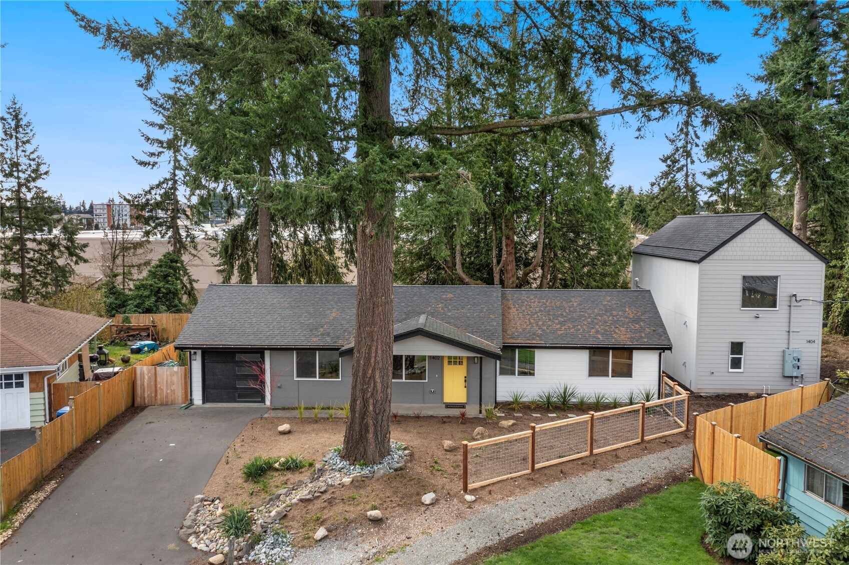 Experience the best of Seattle living in this impeccably reimagined 3 bedroom, 2 bathroom rambler, on the market perfectly in-time for the beauty of the Pacific Northwest spring. Nestled on a private, sun-drenched 5,000 sq. ft. lot on a private cul-de-sac in the heart of Haller Lake, this home has undergone a rare studs-out restoration, offering the perfect blend of modern new-construction luxury and mid-century charm. The heartbeat of this home is the luxury kitchen boasting custom cabinets, expansive luxury quartz counters and premium stainless steel appliances. The open concept living space flows seamlessly to the outdoors, highlighted by luxury flooring and an abundance of natural light. Enjoy the confidence of a completely rebuilt envelope James Hardie siding and Milgard vinyl windows. No detail left untouched in the interior with new electrical, plumbing and zone controlled energy-efficient ENVI heating throughout.    Retreat to a private, professionally landscaped yard featuring a new driveway and paver walkways. Whether you are hosting a spring BBQ or enjoying a quiet morning, this lot offers a true sanctuary in the city. Embrace the season with immediate proximity to the serene trails of North Acres Park and the public shores of Haller Lake for kayaking and recreation. With the Northgate Light Rail Station just minutes away, you have the entire city at your fingertips. Truly a turnkey masterpiece in a coveted location waiting to welcome a new Buyer. Welcome home!