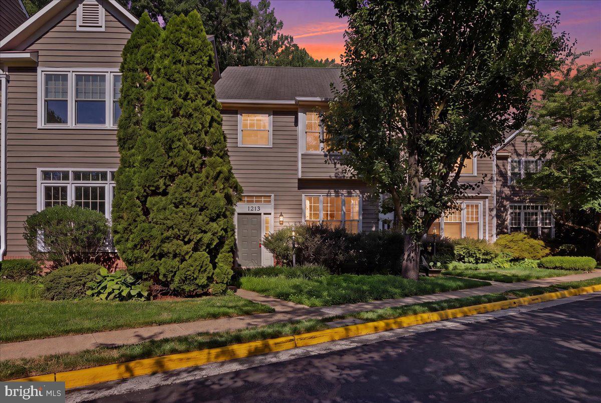 Welcome to this beautifully maintained three-level townhome offering 3 bedrooms, 3 full baths, and 1 half bath in the heart of Reston. Thoughtfully designed with spacious living areas and abundant natural light, this home combines comfort, functionality, and a convenient location.The main level welcomes you with a dramatic two-story foyer and an open layout ideal for both everyday living and entertaining. The living room features soaring ceilings, a fireplace, and French doors that open to a private deck overlooking a peaceful common area with mature trees, creating a serene outdoor setting. Elegant details such as crown molding and chair rail accents enhance the living and dining spaces, while hardwood flooring extends throughout the home, including the upper-level bedrooms.The updated kitchen offers granite countertops, ample workspace, and stainless steel appliances, providing both style and practicality. Upstairs, the spacious primary suite serves as a relaxing retreat with a walk-in closet and a private bath featuring a soaking tub, separate glass-enclosed shower, and dual vanities. Additional bedrooms are generously sized and filled with natural light.The finished lower level expands the home's living space with a large recreation room featuring a second fireplace, making it an ideal area for relaxing, entertaining, hobbies, fitness equipment, or flexible use to suit your lifestyle. A separate office, full bathroom, and dedicated laundry room add convenience and versatility. Walkout access provides an easy connection to the outdoor space.Located within Reston, residents enjoy access to an extensive network of community amenities, including miles of walking and biking trails, open green spaces, lakes, pools, tennis and pickleball courts, playgrounds, picnic areas, recreational facilities, and year-round community programs. Conveniently situated near shopping, dining, commuter routes, Metro access, and major employment centers, this home offers an exceptional combination of comfort, amenities, and location.