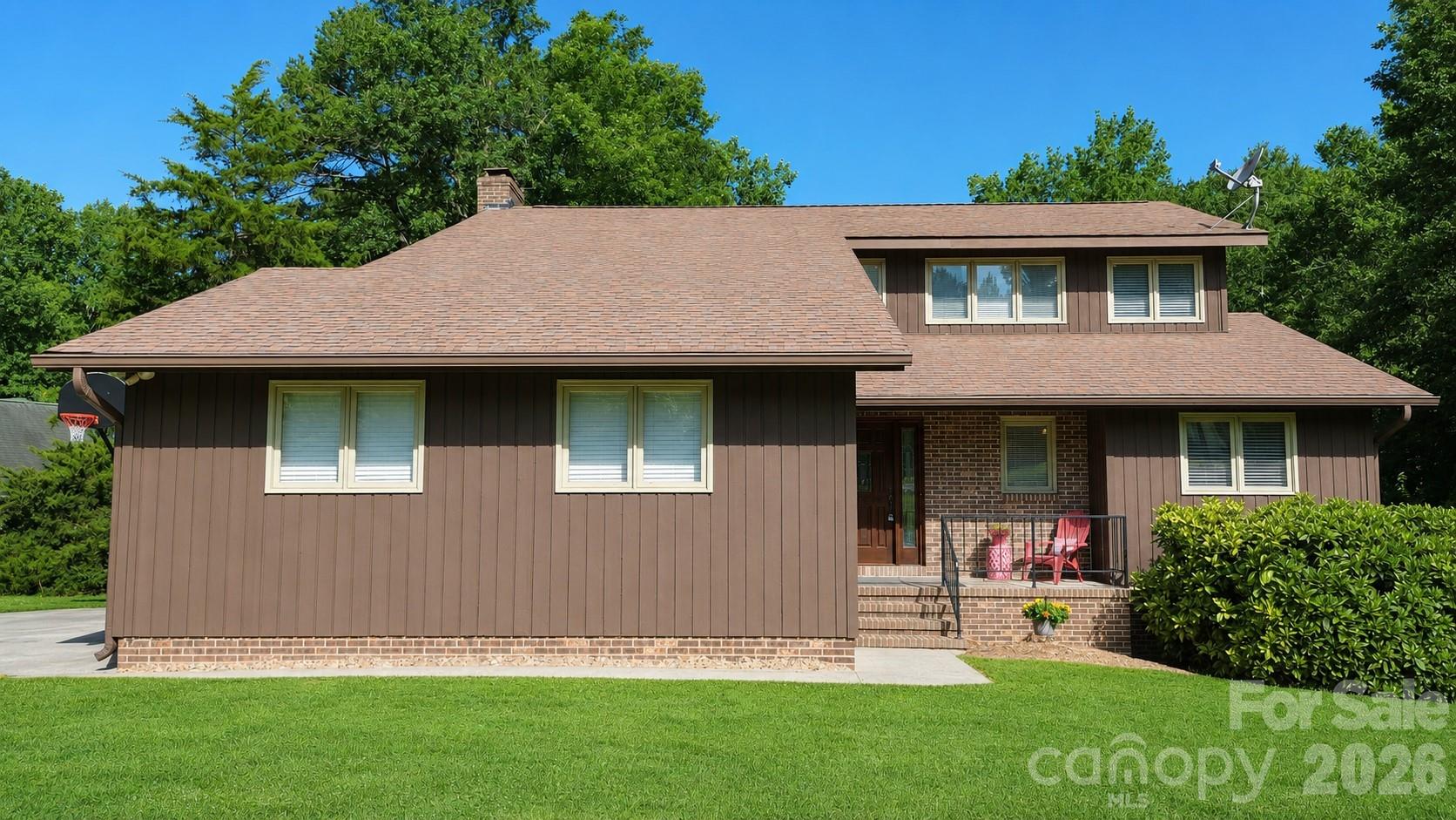 Looking for a home that offers space, privacy, and the perfect setup for entertaining? This one checks all the boxes. Situated on over an acre, the backyard is the star of the show with an 8-foot-deep in-ground pool, diving board, and recent updates including a new pump, sand filter, and cover—just in time to enjoy the season.Conveniently located just off Hwy 16, you'll have an easy commute to Charlotte and Charlotte Douglas Airport while staying close to everything Lake Norman has to offer, from boating and dining to shopping and recreation.Inside, you'll find three levels of finished living space. The upper-level third bedroom includes an adjoining bonus room that's perfect for a playroom, teen hangout, home school space, or additional flex area. The finished basement offers even more room to spread out and includes a full bath with direct access from the pool area—ideal for guests coming in from a day by the water. A built-in desk creates the perfect spot for a home office, homework station, or crafting area. The current owners have also made significant investments for peace of mind, including a Dry Pro basement encapsulation system with a transferable lifetime warranty and a radon mitigation system already in place. Homes with this combination of acreage, privacy, pool, flexible living space, and convenient location don't come along often. Come see why this property is the perfect place to call home.