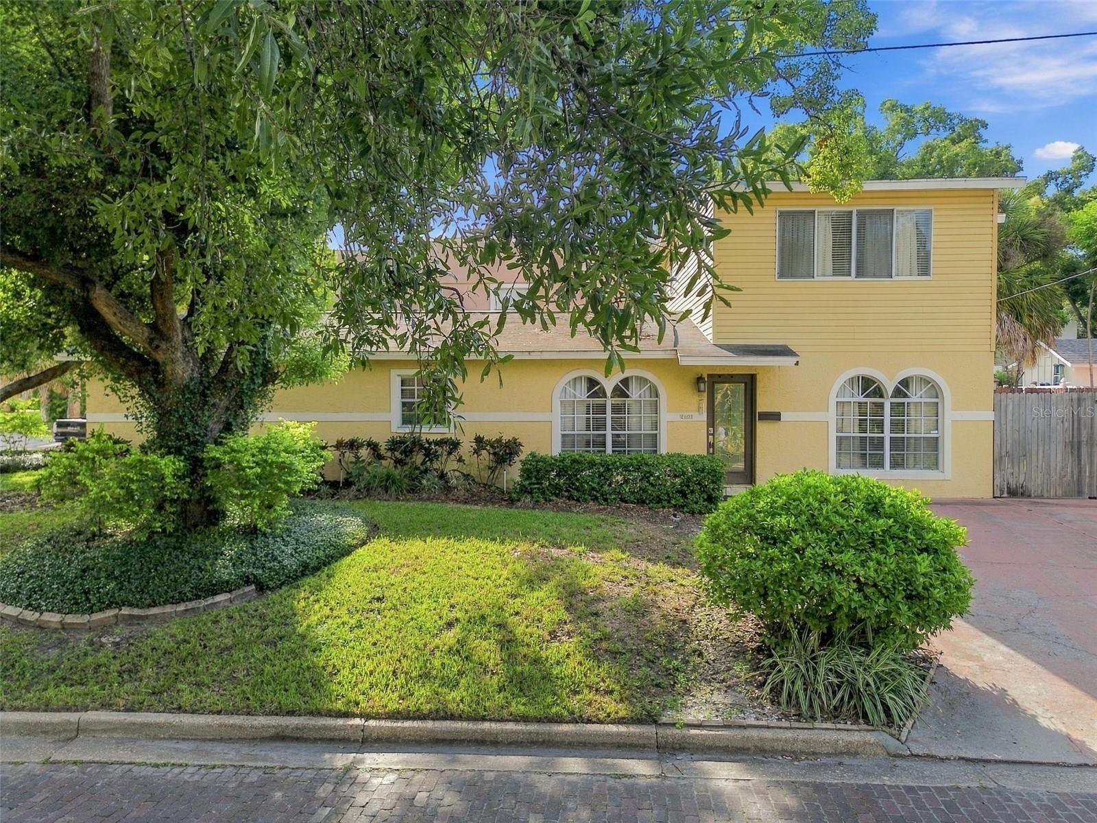 Located on a quiet street in the heart of Palma Ceia, this updated residence offers a bright, open layout, thoughtful upgrades, and a flexible floor plan. Situated within the Plant High School District and Flood Zone X, the property offers a desirable location without the requirement for flood insurance.The main level includes a primary bedroom with an en-suite bathroom, along with two additional bedrooms and a second full bath, creating a highly functional first-floor living option. Upstairs, a separate and private primary suite provides a true retreat with a generous walk-in closet and an oversized en-suite bathroom featuring dual sinks and ceramic tile finishes.The home features a light-filled, open-concept living area where the living room, dining space, breakfast area, and kitchen connect seamlessly, creating an ideal setting for everyday living and entertaining. The kitchen offers custom cabinetry, granite countertops and backsplash, and modern appliances. Just off the kitchen, a dry bar with a built-in wine cooler adds convenience and creates a natural entertaining space.Additional features include two HVAC systems, approximately six and two years old, remodeled downstairs bathrooms completed within the last three years, and no carpet throughout the home, with a combination of tile and vinyl flooring. A dedicated laundry room with additional storage adds everyday convenience.Outdoors, the fully fenced backyard provides flexibility for entertaining, pets, or play, while an oversized triple-wide driveway offers ample off-street parking. The home is situated on a corner lot within a peaceful, established neighborhood.The location is ideal—blocks from the Soho District and just steps from Palma Ceia Park, featuring a dog park, playground, basketball courts, and a covered pavilion. The home is also minutes from Bayshore Boulevard, Hyde Park Village, Water Street, Tampa International Airport, and offers easy access to the Selmon Expressway.Whether enjoyed as-is, reimagined, or held as a high-demand rental investment, this home presents an exceptional opportunity in one of South Tampa’s most desirable neighborhoods.