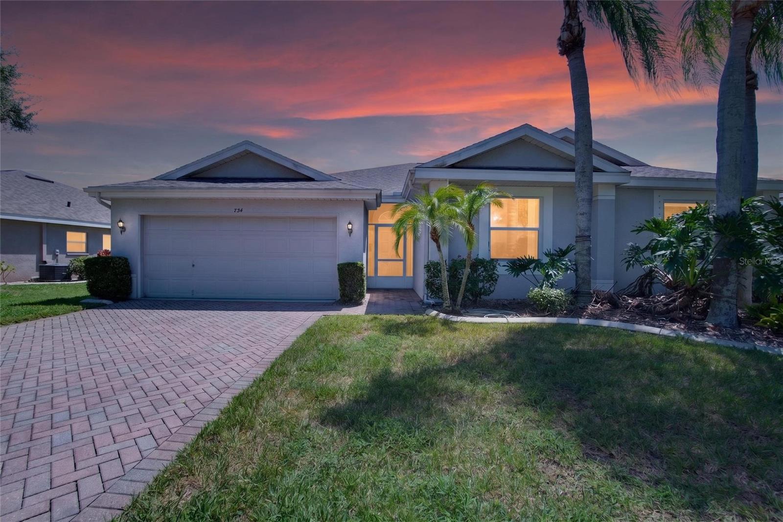 RARE OPPORTUNITY IN KINGS POINT—TURNKEY FURNISHED with a SPECTACULAR WATERFRONT VIEW and an ASSUMABLE 2.9% VA LOAN for qualified buyers! Only a handful of the 114 HOA's in Kings Point are VA eligible. This updated Malibu model overlooks a beautiful pond and wooded conservation area in one of Florida’s premier 55+ active-living communities.A paver driveway and walkway create an inviting first impression. Inside, cathedral ceilings, abundant natural light, and Spanish tile flooring enhance the spacious living and dining areas.The beautifully updated kitchen features bright cabinetry, granite countertops, stainless steel appliances, and a charming eat-in breakfast nook. Sliding glass doors lead to an expansive screened lanai showcasing one of the most impressive water and conservation views in Kings Point—the perfect setting for morning coffee, evening cocktails, grilling, entertaining, or simply relaxing while watching Florida’s wildlife.The spacious primary suite offers vaulted ceilings, a generous walk-in closet, and a private bath with dual sinks, a skylight, and a walk-in shower. A light-filled flex room provides the ideal space for a home office, reading room, hobby area, or additional guest accommodations.The garage adds even more functionality with a screened exterior door, pull-down attic stairs, and additional storage. Valuable updates include a NEW ROOF IN 2025, stainless steel appliances, custom tile flooring, and an HVAC system installed in 2018. THE MANCHESTER II HOA WILL GLADLY WELCOME EMOTIONAL SUPPORT AND SERVICE ANIMALS.Kings Point residents enjoy an extraordinary resort-style lifestyle with multiple clubhouses, fitness centers, six indoor and outdoor heated pools, golf, pickleball, Tennis courts, shuffleboard and lawn bowling, dining, hundreds of clubs and activities, and a complimentary community transportation system. Golf-cart access connects you to shopping, restaurants, medical facilities, and everything Sun City Center's self-contained community has to offer. Tampa, Sarasota, award-winning beaches, airports, professional sports, entertainment, and Tampa’s cruise port are all within convenient reach.Just bring your toothbrush and begin enjoying the Florida lifestyle immediately. Come for the home, stay for the view, and fall in love with Kings Point!