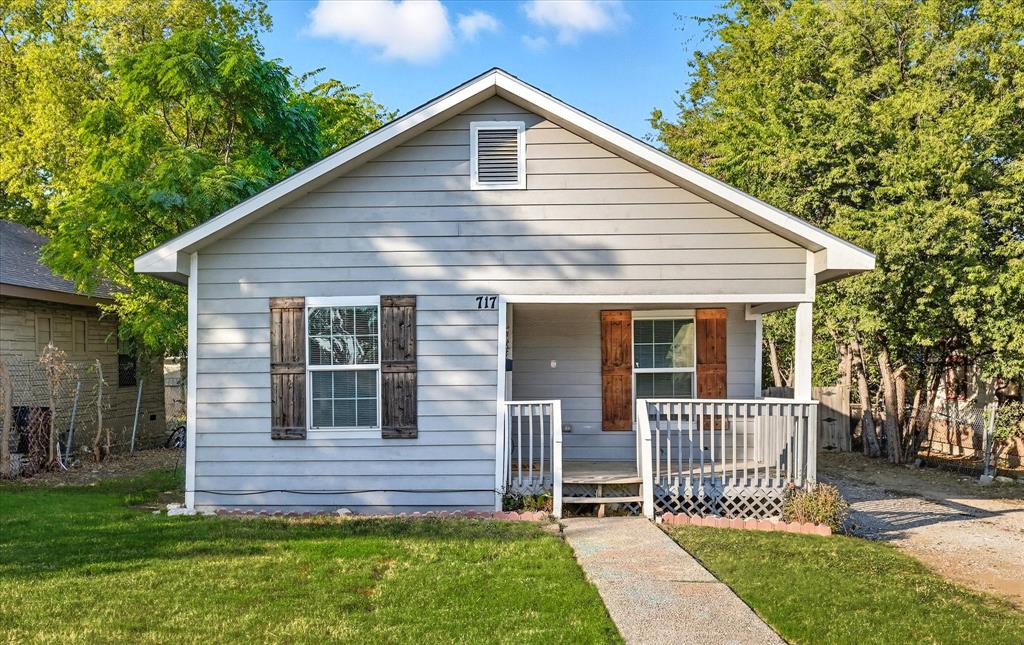 Welcome to this beautifully remodeled home, featuring thoughtful updates throughout! Every major system has been renewed, including electrical, plumbing, roofing, HVAC, water heater, and more, ensuring peace of mind and modern comfort.

Enjoy the luxury of ample parking, with a gated entry fence to the backyard for additional space and security. A charming covered front porch sets the tone, perfect for morning coffee or evening relaxation. Step inside to an open-concept living space featuring a spacious living room, dining area, and kitchen, complete with a full-size washer and dryer area discreetly enclosed for convenience.

From the kitchen, access the covered back patio that overlooks a large backyard with endless possibilities, ideal for entertaining, gardening, or play. The home offers two generously sized bedrooms and a full bath, giving you both comfort and function.

Perfectly located near I-35W and I-30, just 5 minutes from Downtown Fort Worth and zoned to the highly desirable Paschal High School. This move-in ready home combines updates, location, and charm all in one. All that’s left is for you to make it your own!