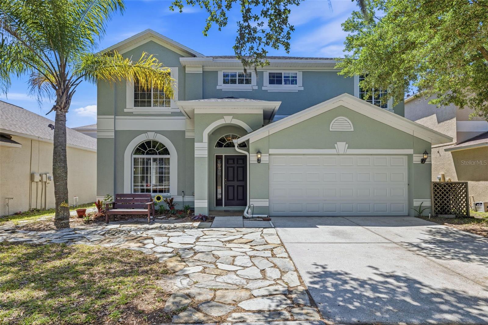 Welcome to this exceptional home in the highly sought-after Heritage Harbor community of Lutz! 4 bedrooms, 2.5-bath residence with a 2-car garage offers the perfect blend of comfort, style, and Florida living.Step inside to discover a bright, inviting layout filled with natural light and thoughtfully chosen, modern colors that create a warm and lively atmosphere throughout. The updated kitchen is a standout feature, boasting rich wood cabinetry, sleek granite countertops, and plenty of space for both everyday living and entertaining.The home offers generous living areas, including ample space for a pool table or game room setup—perfect for hosting friends and family. Upstairs and down, the flexible floor plan adapts easily to your lifestyle needs.Outdoors is where this property truly shines. Enjoy your own private retreat with an extended lanai and a custom pool, ideal for relaxing or entertaining year-round. The large backyard is beautifully enhanced with a private putting green, offering a unique touch for golf enthusiasts and outdoor enjoyment.Additional highlights include a roof that’s only 5 years old, providing peace of mind for years to come.One of the biggest draws of this home is its location within an outstanding school district, including Steinbrenner High School, Martinez Middle School, and McKitrick Elementary—making it an excellent choice for families prioritizing top-rated education.With its unbeatable combination of upgrades, outdoor living, and prime location, this home is a rare opportunity in Heritage Harbor. Don’t miss your chance to make it yours!