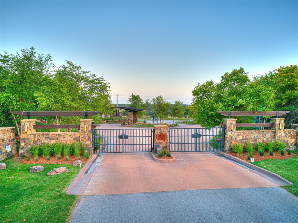 Enjoy the picturesque setting & abundant beauty from the lush, wooded countryside afforded by the exclusive gated community of Forest Creek Estates in East Edmond. The sophistication & uniqueness of this development is immediately showcased upon arrival. Extensive landscaping, large boulders & waterfalls set the tone for the rustic & modern Colorado inspired mountain scenery. The 5 acre lake & 15 acre nature preserve will inspire you to enjoy the ability to disconnect & take full advantage of the serene amenities offered in this environmentally friendly community. This land was developed & designed specifically for those who wish to create their own distinctive oasis. Located just minutes from the continuously developing I-35 corridor, the convenience achieved at this location adds to the expansive list of qualities this development offers to future residents. See attached for covenants & approved builder list. Developer will not consider other builders at this time.
