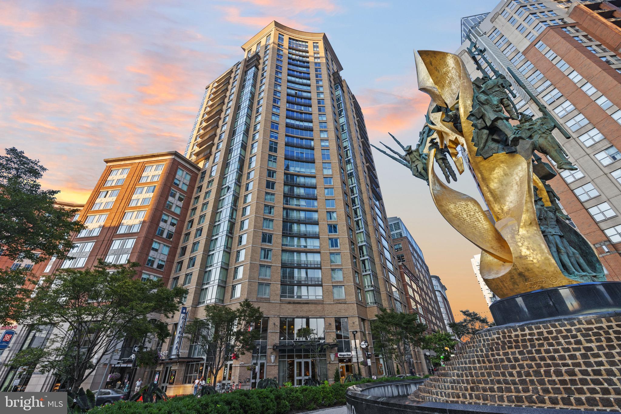 Experience elevated city living in this spectacular corner two-bedroom, two-bath residence at The Vue, ideally positioned in the heart of Harbor East with sweeping water and skyline views. Framed by oversized windows, this exceptional home captures breathtaking vistas of the Inner Harbor, Patapsco River, and cityscape, creating a stunning backdrop from sunrise to sunset. Designed with both sophistication and comfort in mind, the residence features a newly renovated gourmet kitchen with sleek custom finishes, an expansive island perfect for entertaining, and seamless flow into the open-concept living and dining spaces. Every detail has been thoughtfully curated, including designer lighting, upgraded flooring, and striking custom wallpaper, all contributing to its triple mint condition. The spacious living area extends effortlessly to an expansive private balcony, offering the perfect setting for morning coffee, evening cocktails, or simply taking in the vibrant waterfront energy below. Motorized blinds and custom drapery add both convenience and elegance throughout the home. The luxurious primary suite is a true retreat, featuring dramatic corner windows, a walk-in closet, and a spa-inspired bath complete with a soaking tub and glass-enclosed shower. A generous second bedroom and full bath provide flexibility for guests, a home office, or additional living needs. One covered parking space is included. Residents of The Vue enjoy unrivaled convenience in one of Baltimore’s most sought-after neighborhoods, just steps from the city’s finest dining, boutique shopping, Whole Foods, Starbucks, the waterfront promenade, nightlife, Harbor East Cinemas, and direct elevator access to the MAC gym. A rare opportunity to lease a fully customized, move-in-ready luxury waterfront residence in one of Harbor East’s premier full-service buildings.