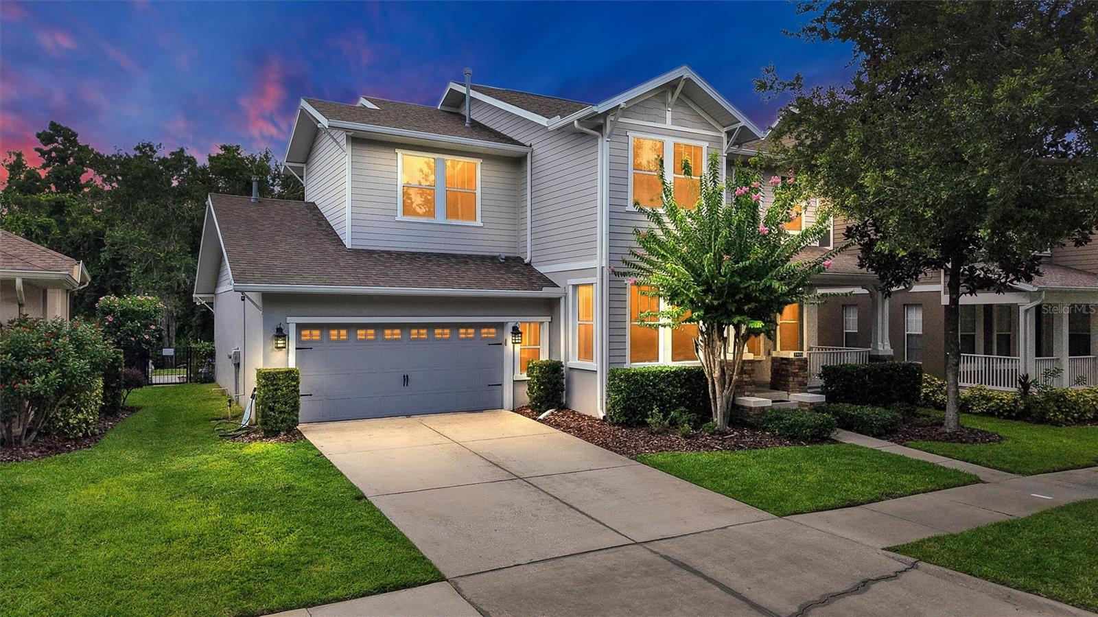 One or more photo(s) has been virtually staged. Welcome to Your Dream Home! Nestled in one of Tampa Bay’s most sought-after master-planned communities, this stunning Cardel Built Gulfstream floor plan is located in the charming Garden District and surrounded by top-rated, A schools. Brimming with curb appeal, the home showcases elegant neo-traditional architecture with stacked stone accents and an inviting front porch. Step inside to discover a seamless blend of luxury and comfort, featuring luxury vinyl flooring throughout, plantation shutters, a formal dining room, and a private study complete with a wet bar. The grand family room boasts 20-foot ceilings, a wall of windows that flood the space with natural light, and a custom built-in doggie den—a thoughtful touch for pet lovers. The gourmet kitchen is a chef’s dream with Espresso-stained shaker cabinetry, a huge granite island, Stainless Steel Appliances, walk-in pantry, and a convenient butler’s station/pantry! Upstairs, enjoy the versatility of a spacious loft, ideal for a media room or play space. The primary bathroom has been newly renovated, offering a spa-like retreat. Step outside to your private backyard oasis, where a Fully Enclosed sparkling pool and spa overlook serene, park-like conservation views—perfect for relaxing or hosting gatherings. This wonderful community grants access to resort-style amenities including the Aquatic Club with 32-ft water slide & beach-entry pool, Lap pool, fitness centers & clubhouses, Tennis & basketball courts, skate park, dog park, and miles of scenic trails and nature preserves! The home close walking distance to FishHawk Creek Elementary and Park Square, where you’ll find shopping, dining, splash fountains, and vibrant year-round community events. Don’t miss your chance to own this exceptional home—schedule your private showing today and experience the best of FishHawk Ranch living!