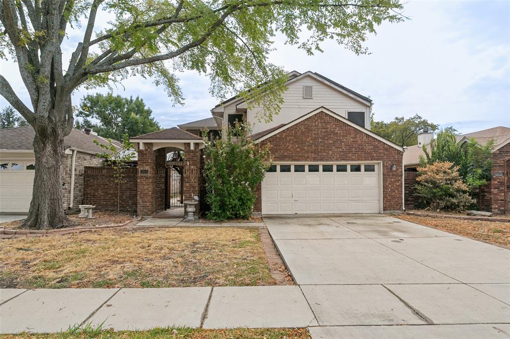 Charming brick 4-bedroom, 2.5 bath two-story home on a low-maintenance zero-lot in the heart of Plano! A covered brick archway and wrought-iron gate open to a private courtyard. Inside, a beveled-glass front door welcomes you to a formal dining area with plantation shutters, wainscoting, and crown molding. The living room impresses with soaring vaulted ceilings, a fireplace with built-in cabinetry, and an open staircase leading to an overlook balcony. The bright kitchen features white cabinetry, a large center island, mosaic glass tile backsplash, stainless steel appliances, and skylights, opening to a breakfast area. Spacious bedrooms offer vaulted ceilings, ceiling fans, plantation shutters, and plush carpet. Outside, enjoy a covered patio and a cedar pavilion with ceiling fan, all enclosed by brick privacy walls. 2-car garage. Plano ISD. Minutes from a recreational center, shopping, and dining, with easy access to US-75, the Dallas North Tollway, and SH-121!