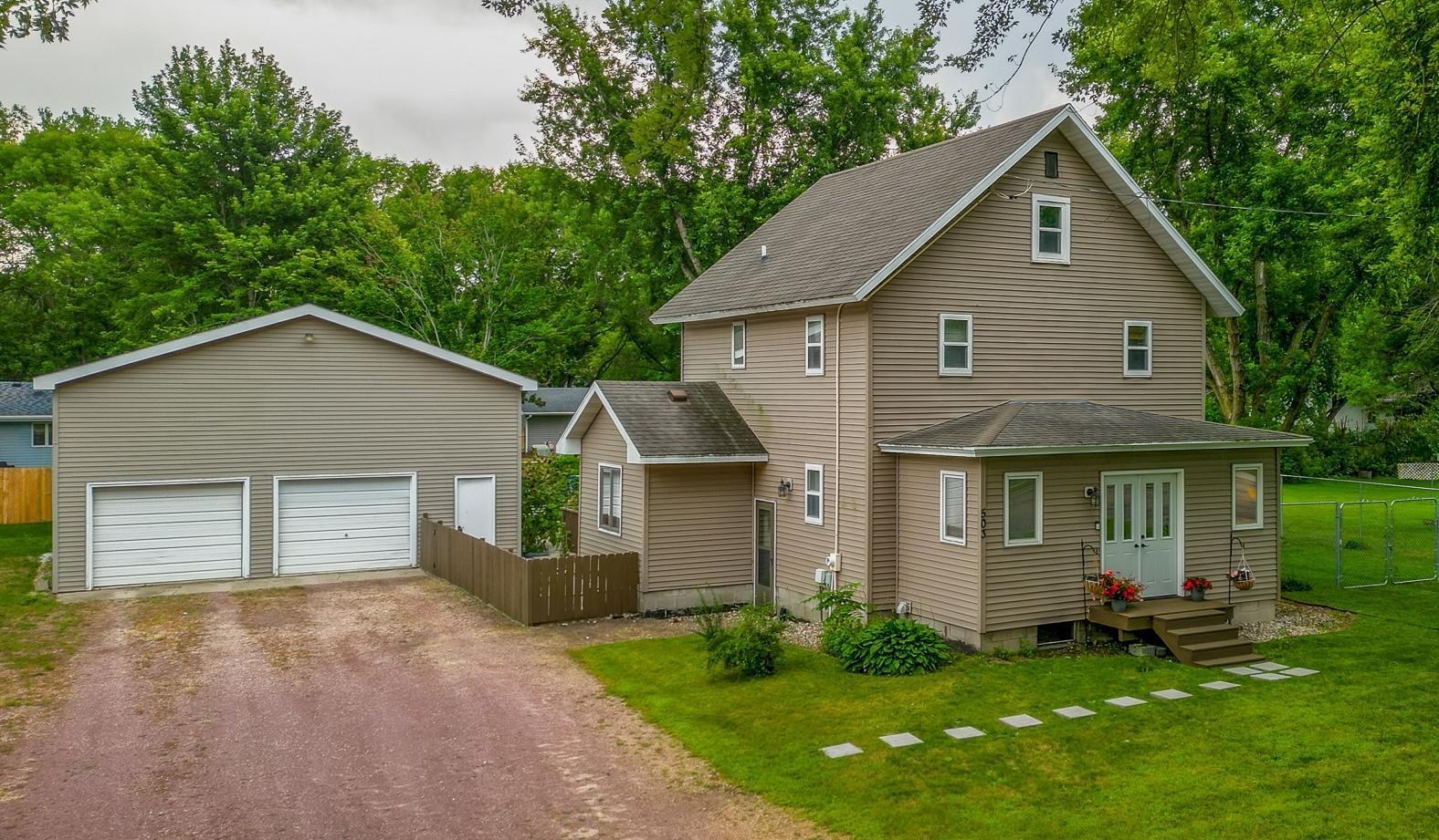 With a stately presence, over-sized garage, fenced yard and loads of character, this Mapleton property is one you'll want to see. The main floor features a mudroom entryway off the deck, 1/2 bath, large kitchen, dining room, living room, playroom/office (or bedroom), and laundry area w/current home office space. Upstairs on the 2nd floor, 3 bedrooms, a full bath, AND access to the 3rd floor attic space await; this would make great finished space! The basement offers more storage options and is currently used as a 2nd home office. The large deck is ideal for entertaining or relaxing, there is plenty of space for gardening, playing and more. At 900 square feet, the garage is an absolute dream space! With hardwood floors throughout the main floor, original woodwork throughout, tasteful updates, and plenty of additional potential to maximize living spaces, plus proximity to the city park and school, this charming property is a must-see!