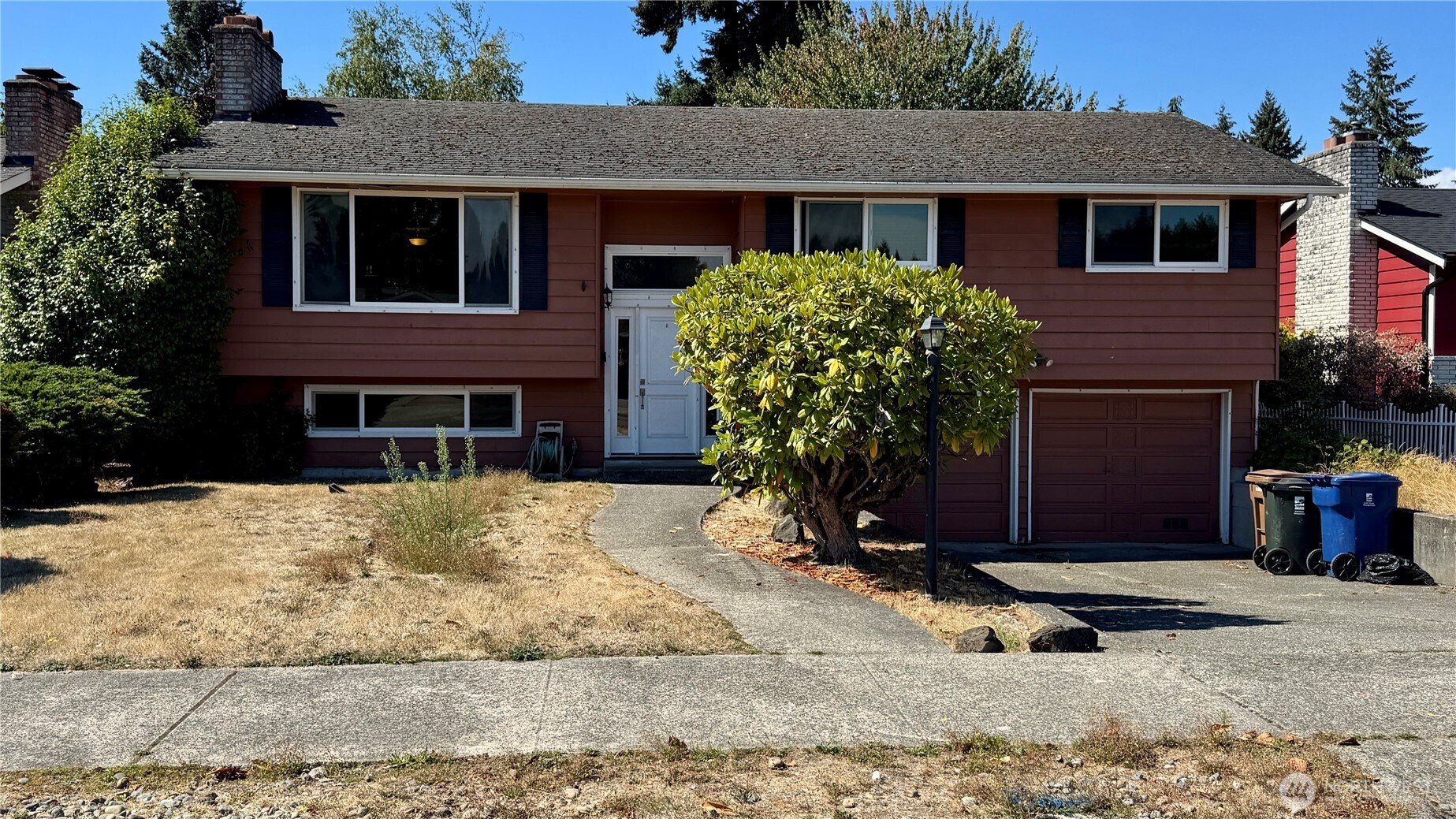INVESTOR Alert-Bring your vision and unlock the incredible potential of this North Tacoma home! Remodeled down to the studs in 2008, the main level features quality finishes including granite countertops, stainless steel appliances, a cozy wood-burning fireplace, and an open, comfortable living space. Offering 1,322 finished square feet today with approximately 1,964 square feet of potential, the professionally remediated lower level has been opened up and is ready for your ideas. A 3/4 bath is already located on the lower level, creating an excellent foundation for additional living space, a guest suite, home office, media room, or recreation area. Situated on a nearly 0.20-acre lot with a spacious two-car garage that includes a storage room, this property offers the rare opportunity to build equity while customizing the home to fit your needs. The major remodeling completed in 2008 provides a strong starting point, while the unfinished lower level gives you the flexibility to finish it your way. Sold as-is, this is an outstanding opportunity for homeowners, investors, or anyone looking for a home with great bones and room to grow.
