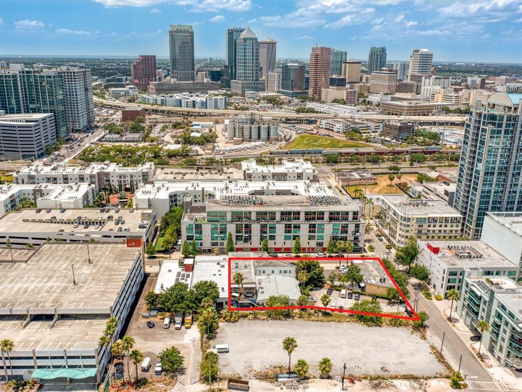 This portfolio of adjoining properties includes 102, 108, 110 & 112 S 12th St and sits in a prime location at the center of the rapidly developing Channelside District. Situated between both upscale residential buildings and widely visited commercial venues it provides premier visibility and foot traffic from locals and visitors alike. The combined parcels create a land footprint of .73 acres (approx 31,870 sqft). With a mixed-use (CD-1) zoning classification, this corner property has endless possible future uses. This development site is located less than one mile from many major attractions including Amalie Arena, Water Street, Tampa Convention Center, Sparkman Wharf, Tampa Riverwalk, The Florida Aquarium, Downtown Tampa & more. From retail or commercial space to an ideally located collection of residences, this is a chance to own an expansive property in one of Tampa’s most exclusive markets.