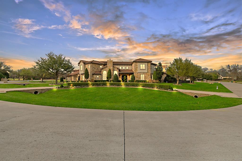 Situated on an acre in the prestigious community of Tranquility Farms and zoned to highly acclaimed Lovejoy ISD, this exceptional luxury estate offers a perfect blend of elegance, comfort, and functionality. The home welcomes you with grand architectural details, soaring ceilings, and expansive living spaces filled with natural light. Designed for both everyday living and entertaining, the open-concept layout flows effortlessly between the main living areas and a gourmet kitchen equipped with high-end appliances, double dishwasher, custom cabinetry, generous counter space, and an oversized island ideal for gathering. The private primary suite serves as a serene retreat with a spa-inspired bathroom and spacious walk-in closet, while additional bedrooms provide comfortable accommodations for family and guests along with two laundry rooms(one downstairs and one upstairs). Multiple living and entertaining areas throughout the home offer flexibility for work, relaxation, and hosting. Outdoors, the expansive property provides an amazing pool-spa oasis, full outdoor kitchen, a living space with a fireplace, beautiful green space and room to enjoy peaceful surroundings with plenty of privacy. Combining refined craftsmanship, thoughtful design, and a prime location close to shopping, dining, and major commuter routes, this home offers an elevated lifestyle in one of Fairview’s most desirable communities.