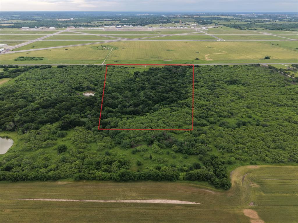 24+ Acres Prime Location. High Visibility in North Texas Growth CorridorLocated directly across from North Texas Regional Airport near the intersection of U.S. Highway 82 and Highway 289, this 24+ acre tract sits in one of the fastest growing corridors in North Texas.With strong highway proximity, excellent accessibility, and steady traffic flow, this property offers outstanding exposure and long-term upside as development continues to expand throughout the area.This tract is well-positioned for a wide range of potential uses:Commercial development (retail, fuel station, travel center, restaurant pads)Industrial or flex space tied to airport growthMulti-family or mixed-use projectsRV park or hospitality conceptLong-term investment hold in a rapidly appreciating corridorSurrounded by ongoing development and directly across from a regional airport, this is the type of property that benefits from location, visibility, and future growth all in one.North Texas is expanding fast—and opportunities like this, especially near a major airport and key highway access, are becoming harder to find.