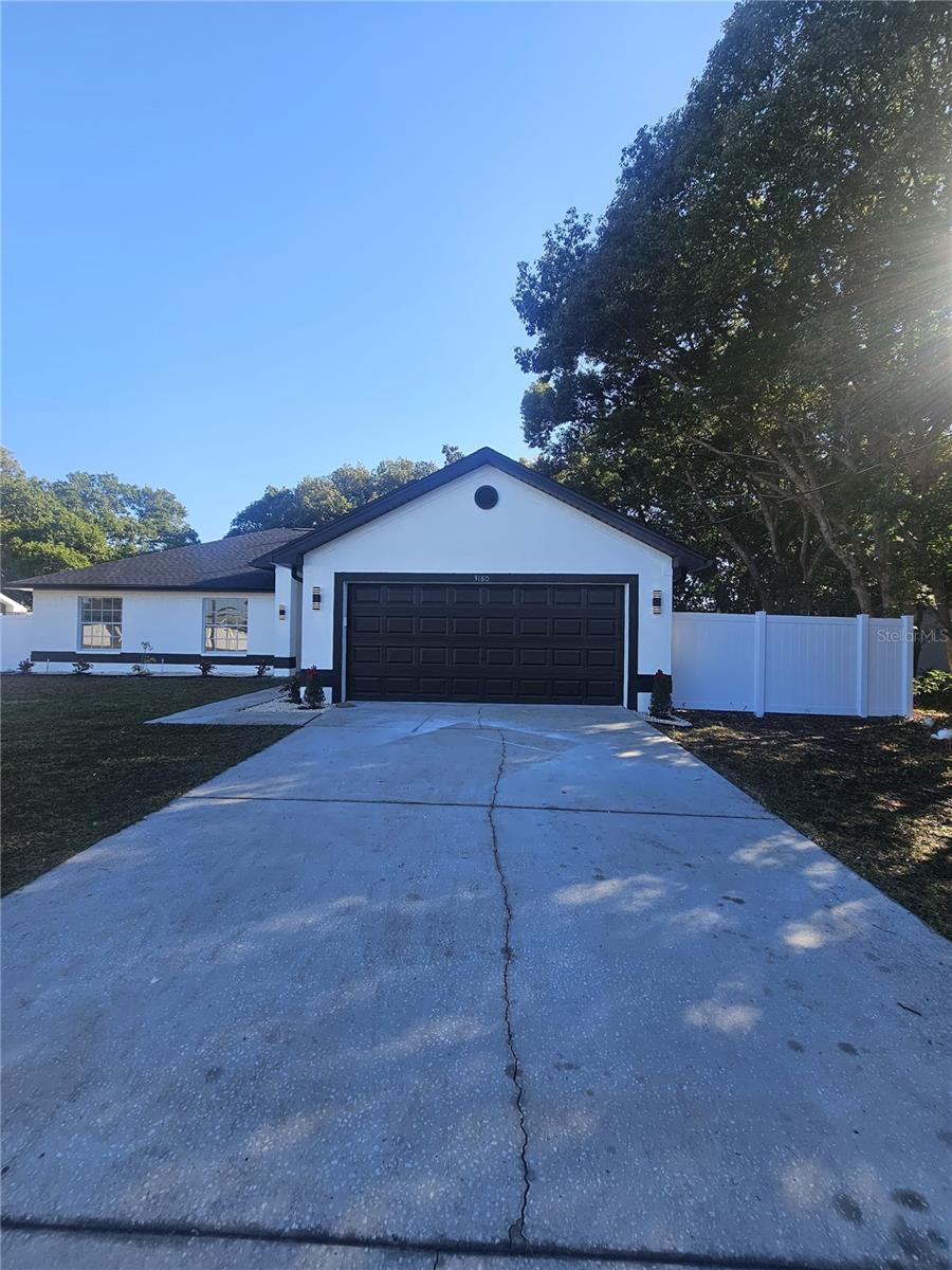 Welcome to 3180 Wiltshire Ave, Spring Hill, FL 34608 — a fully renovated home that blends modern upgrades with everyday comfort. This move-in-ready property features a brand-new roof, new AC unit, and a new water heater, offering peace of mind for years to come. Inside, you'll find elegant new porcelain tile flooring throughout, along with freshly remodeled bathrooms and a stylish kitchen equipped with new cabinets, quartz countertops, and stainless steel appliances including a stove, dishwasher, and microwave. The home has been freshly painted inside and out, creating a clean, inviting atmosphere.
Outside, the property offers a new PVC privacy fence along the right side and a gated PVC entrance on the left, ideal for secure access and curb appeal. The septic tank has been recently emptied, and the home is located in a non-flood zone, which means added security and potential savings on insurance. With no HOA restrictions, you’ll enjoy the freedom to personalize your space.
This home is ideally situated near some of Spring Hill’s most popular attractions. Weeki Wachee Springs State Park, known for its natural springs and mermaid shows, is just 5.5 miles away. Nature Coast Botanical Gardens, a peaceful retreat with themed gardens and walking paths, is only 3.2 miles from the property. Delta Woods Park, offering tennis courts, trails, and playgrounds, is just 2.5 miles away. For shopping and dining, Spring Hill Drive is less than 2 miles away, and the Suncoast Parkway (FL-589) is approximately 6 miles, making commuting to Tampa and surrounding areas easy and convenient.
Whether you're a first-time buyer, retiree, or investor, this turnkey home offers style, location, and value. Schedule your private showing today and discover the comfort and style that 3180 Wiltshire Ave provides.