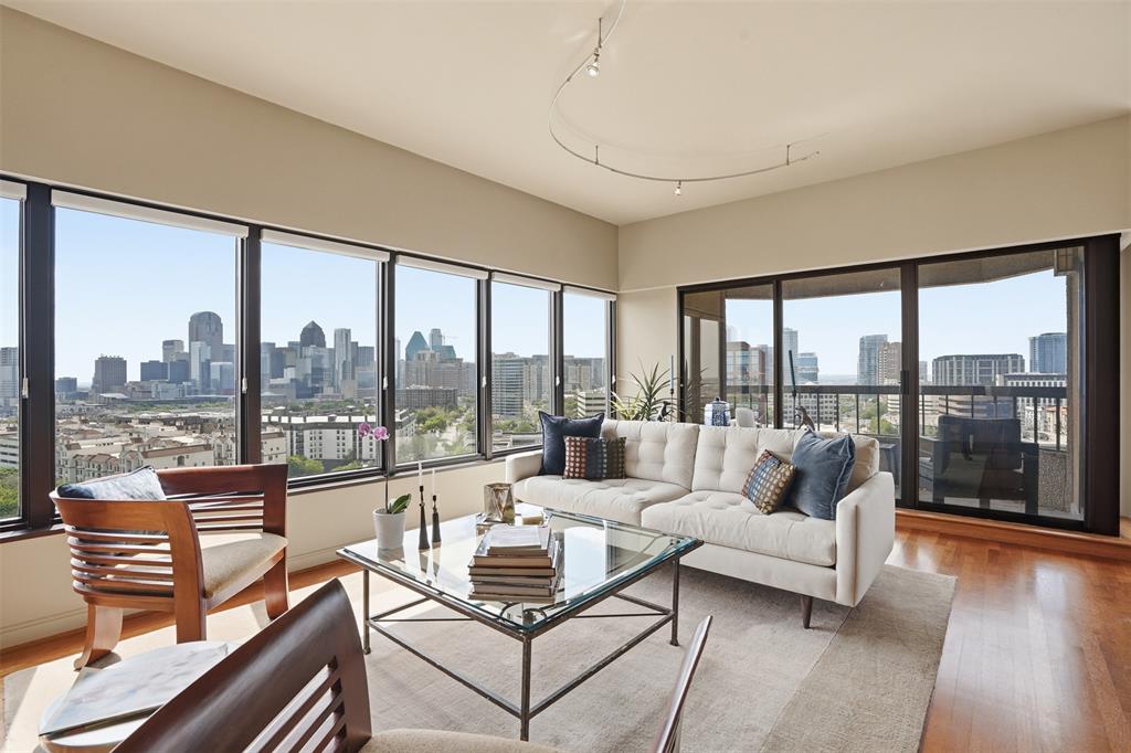 Elevated on the 16th floor of the iconic La Tour, this 3,126-square-foot double residence breaks the mold of standard high-rise living. By merging two units into one cohesive, L-shaped floor plan, designers Marco French and Ike Eisenhower created a space that feels more like a sprawling estate in the sky than a traditional condo. Perimeter walkways wrap around the home, ensuring that the 270+ degree views—stretching from the iconic Downtown skyline and Fair Park to North Dallas—are always the focal point.The layout is intentionally split into two distinct wings to balance high-end entertaining with total privacy. Wing one is built for hosting, featuring an expansive living and dining area, full kitchen, guest suite, library, and a flexible executive office that easily converts into a third bedroom. On the other side, wing two is a dedicated retreat, anchored by a massive primary suite with a spa-inspired bathroom and dual ELFA closets. It also houses a refined media lounge equipped with a full bar, wine fridge, and ice machine—perfect for late-night movies or a quiet drink.  The tech and perks here are just as impressive as the views. The home is outfitted with Grafik Eye lighting, a 12-speaker Sonos system, and Hunter Douglas shades. Rare for Uptown, the property includes four parking spaces, two storage units, and two board votes.Living at La Tour means more than just a great view; it’s a full-service lifestyle. You’re steps away from the Katy Trail and the best dining in Uptown, but you also have a resort-style pool, a fully equipped gym with saunas, tennis and pickleball courts, and a private dog park right at home. With 24-hour concierge, valet, and a long-tenured staff handling everything from security to packages, the experience is entirely effortless. Whether you’re throwing a party against a backdrop of city lights or disappearing into your private wing, this is a level of space and security that’s hard to find anywhere else in the city.