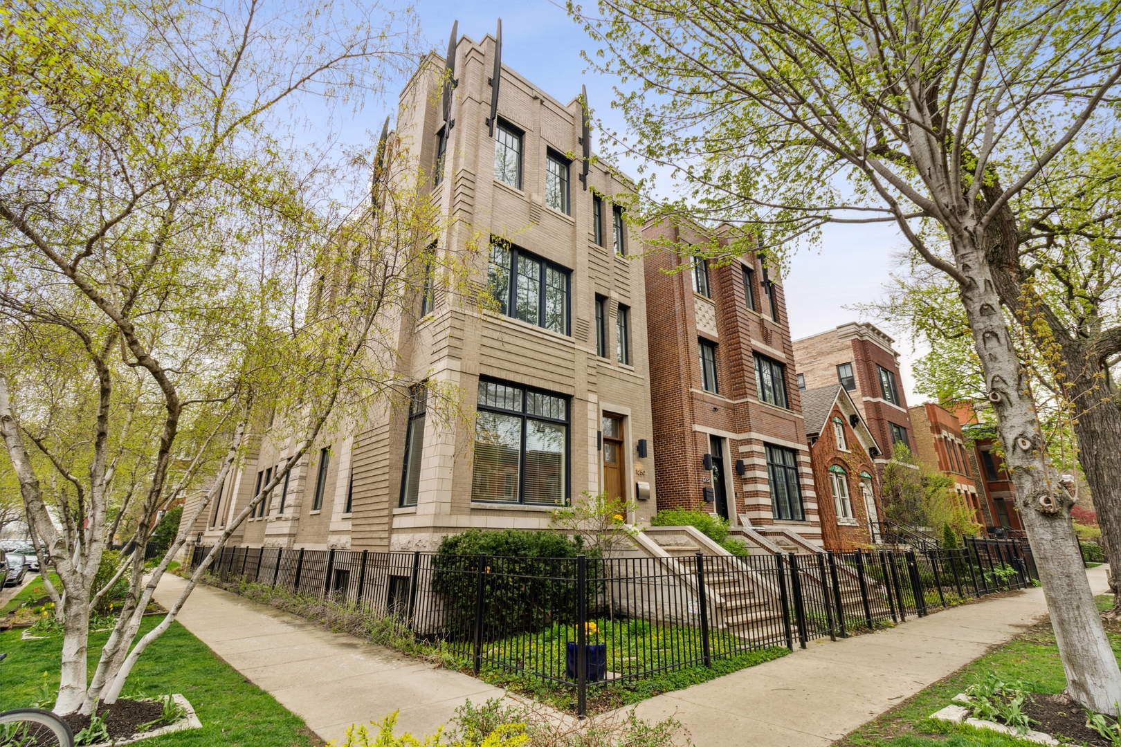 Beautiful and elegant modern corner 6bd/4.5ba home in the heart of Wicker Park's historic Hoyne Ave. Bright, spacious, and professionally designed living, sitting, and dining rooms, beautiful wood burning fireplace, high ceilings, and hardwood flooring on all three upper levels. Kitchen feature high-end stainless-steel appliances, and concrete countertops. Kitchen opens to the family room with a gas starting fireplace. Ride the central elevator to the second floor to view four bedrooms, library, and laundry rooms. Take the elevator to the third floor to enter   the owner's suite with a large walk-in closet and primary bathroom and doors going out to your private outside sanctuary area. Take the elevator down to the lower level and enjoy your steam shower, sauna, gym, billiard and media rooms or relax a bit in your guest suite. Home features 3 beautiful finished outdoor spaces with amazing views of downtown skyline and sunset. Walking distance from blue line and all of Wicker Park and Division Street nightlife.