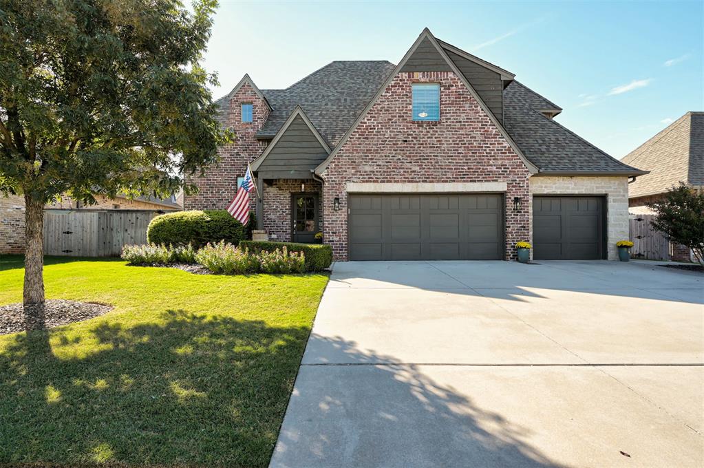 Welcome to Meritage Park, one of Edmond’s most desirable gated communities—where elegance, comfort, and convenience come together.

Step inside this beautifully designed home and you’ll immediately notice the open-concept flow from the kitchen to the living room, featuring vaulted ceilings with wood beams and a fireplace that anchors the space with warmth and style.

The kitchen is built to impress, with a massive island, custom cabinetry that extends to the ceiling, and state-of-the-art appliances that make both daily cooking and hosting guests a breeze.

Head outside to your covered patio, complete with a brick fireplace and built-in grill—a true entertainer’s dream. Whether it’s summer BBQs, quiet mornings with coffee, or cozy evenings by the fire, this space was made to be enjoyed.

Inside, the layout is perfect for flexibility and comfort, offering two full suites downstairs and two additional bedrooms plus a bonus room upstairs. There’s also a dedicated dining space, ideal for family dinners or formal gatherings.

The primary suite is a retreat of its own, featuring dual vanities, an oversized soaking tub, and a custom-tiled shower. Practical features include a three-car garage, tankless water heater, storm shelter, and garage cabinetry that can remain with an acceptable offer. The washer, dryer, and refrigerator may also stay—an added bonus that makes moving in even easier.

And when it comes to maintenance, Meritage Park makes life simple—the HOA covers all lawn care, plus access to the community pool, gated entry, and upkeep of all common areas.

This home isn’t just beautiful—it’s functional, flexible, and built for entertaining.