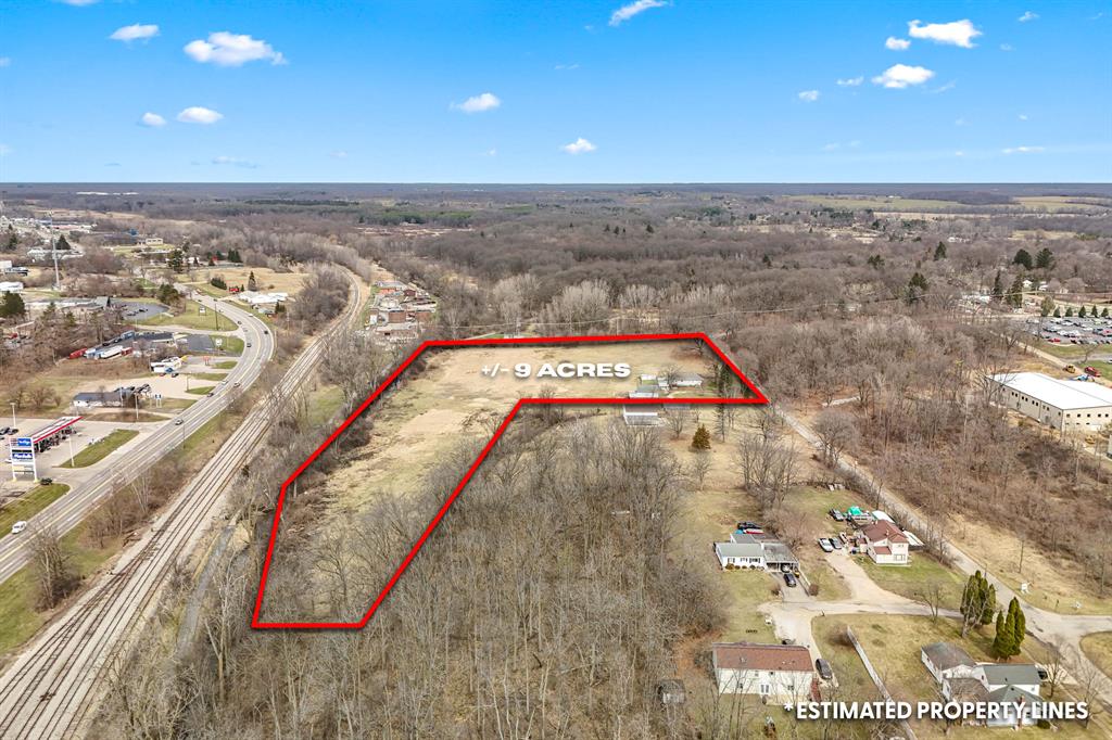 RARE 9-acre development opportunity located within the City of Hillsdale, bordering Hillsdale College and just steps from the new Hillsdale College hotel development. This prime parcel offers over 1,000 feet of road frontage on two roads, providing excellent accessibility and significant future development potential. The property includes a 3-bedroom, 2-bath home, a 22x38 utility building, a 30x24  heated barn, and an additional utility shed. Ideal for investors, developers, or those seeking a large parcel in a highly desirable and growing area. Investments may be subject to city approval. County records used for included information. Buyers should verify all information independently. Call the listing agent for more details or to schedule a showing.