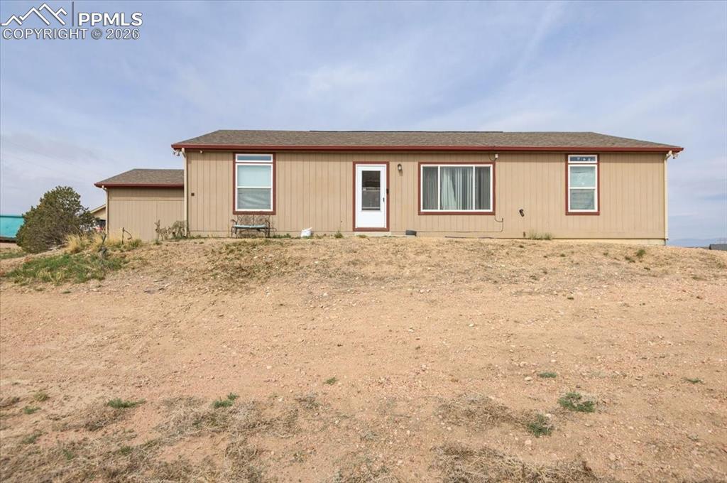 Experience wide-open space and Colorado views in this 3-bedroom, 2-bath home situated on over 3 acres just outside of Fountain. Conveniently located between Colorado Springs and Pueblo, with a quick drive to Fort Carson, this property offers the ideal balance of accessibility and quiet country living.Surrounded by expansive Front Range scenery, the setting delivers the kind of privacy and freedom that’s hard to find. Inside, the home features an open-concept layout designed for everyday living, with a spacious kitchen that includes a large center island, modern cabinetry, and plenty of room to gather. Natural light flows through the main living areas, and a sliding glass door provides easy access to the outdoors and frames the surrounding landscape.While the home has a solid foundation and great layout, it offers an opportunity for a new owner to add personal touches and bring out its full potential.The property is well-suited for those needing extra space for vehicles, hobbies, or equipment, with both an attached garage and a sizable detached garage/workshop. There’s also ample room for RV parking, outdoor recreation, or even horses. A fenced backyard adds additional functionality and separation from the open acreage.With scenic views, usable land, and room to make it your own, this property presents a unique opportunity for buyers looking to create their ideal Colorado lifestyle.