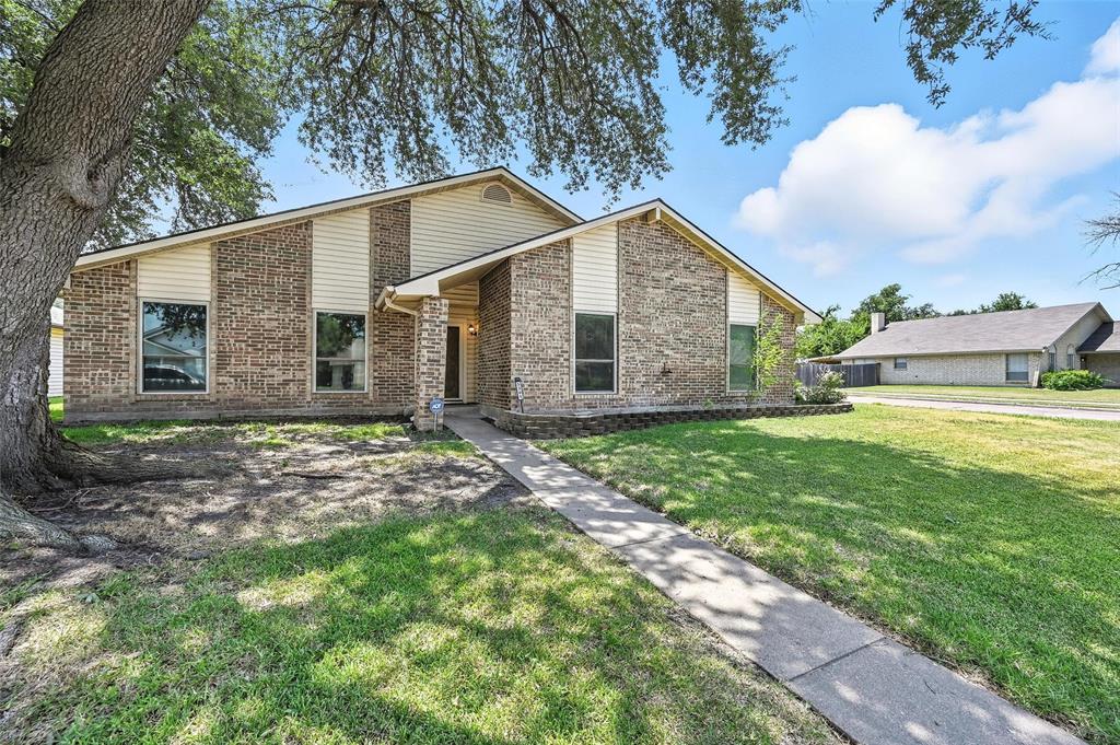 You will fall in love with this 4-bedroom, 2-bath Garland home with 2,076 sq ft of inviting living space designed for connection and comfort. The updated kitchen features granite countertops, custom cabinetry with glide drawers, full-size pantry, and stainless appliances — perfect for cooking and entertaining. Enjoy two spacious living areas, a cozy wood-burning fireplace, wet bar, breakfast room overlooking the patio, and a formal dining room for special gatherings. The primary suite includes a sitting area, dual closets, and a private ensuite bath. Throughout the home you’ll find thoughtful touches like a hand-crafted wood front door, vaulted ceilings, double-pane windows, skylight, and laundry room built-ins with freezer space. Step outside to your backyard retreat — a large fenced yard with sprinklers, a covered patio, and a huge pool refurbished in 2020, ready for summer fun. Recent updates include: new roof, new fence, new hot water heater, new dishwasher, and updated electrical panel (2023–2025). Located just minutes from I-635 and I-30, makes Dallas commutes a breeze. Close to parks, schools, and Garland’s best amenities. If you’re dreaming of a place where your family can grow, laugh, and build memories, this home is ready to welcome you.