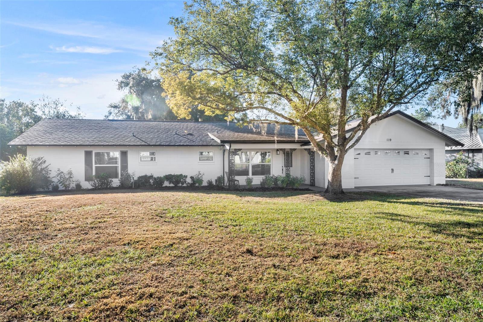 Set on 1.17 acres with over 100 feet of water frontage on a spring-fed, standalone recreational Lake Hayes. This well maintained Oviedo lakefront home offers space, privacy, and timeless charm. Just 2 miles from UCF and Oviedo on the Park, with close access to SR-417 and no HOA.Built in 1962, the home embraces its retro ranch character, with original terrazzo flooring preserved beneath portions of the home and real wood flooring throughout the main living areas. A spacious living room anchors the layout, offering expansive lake views and an ideal setting for gathering or entertaining.The split layout places all three bedrooms on one side of the home. The massive oversized mudroom/laundry room adds flexibility rarely found in homes of this era. Spacious bedrooms feature custom cedar-lined walk-in closets, and new tempered, hurricane-rated windows (2024) flood the home with natural light.Major system updates provide peace of mind, including roof (2019), A/C condenser and air handler (2024), some interior doors (2024), and a fully updated septic system with new drain field and alarm (2018). The home was also freshly painted inside and out last year.Outdoors, the property opens to an expansive, open backyard shaded by a stunning mature oak, with room to add a pool, dock, or future enhancements. The lake offers beautiful sunrise and sunset reflections, and the spring-fed water supports boating, kayaking, and fishing.Located on a quiet dead-end street with no cut-through traffic, this one-story, 2,092 sq ft lakefront home presents a rare opportunity to enjoy space, freedom, and natural beauty, while being minutes from major conveniences.