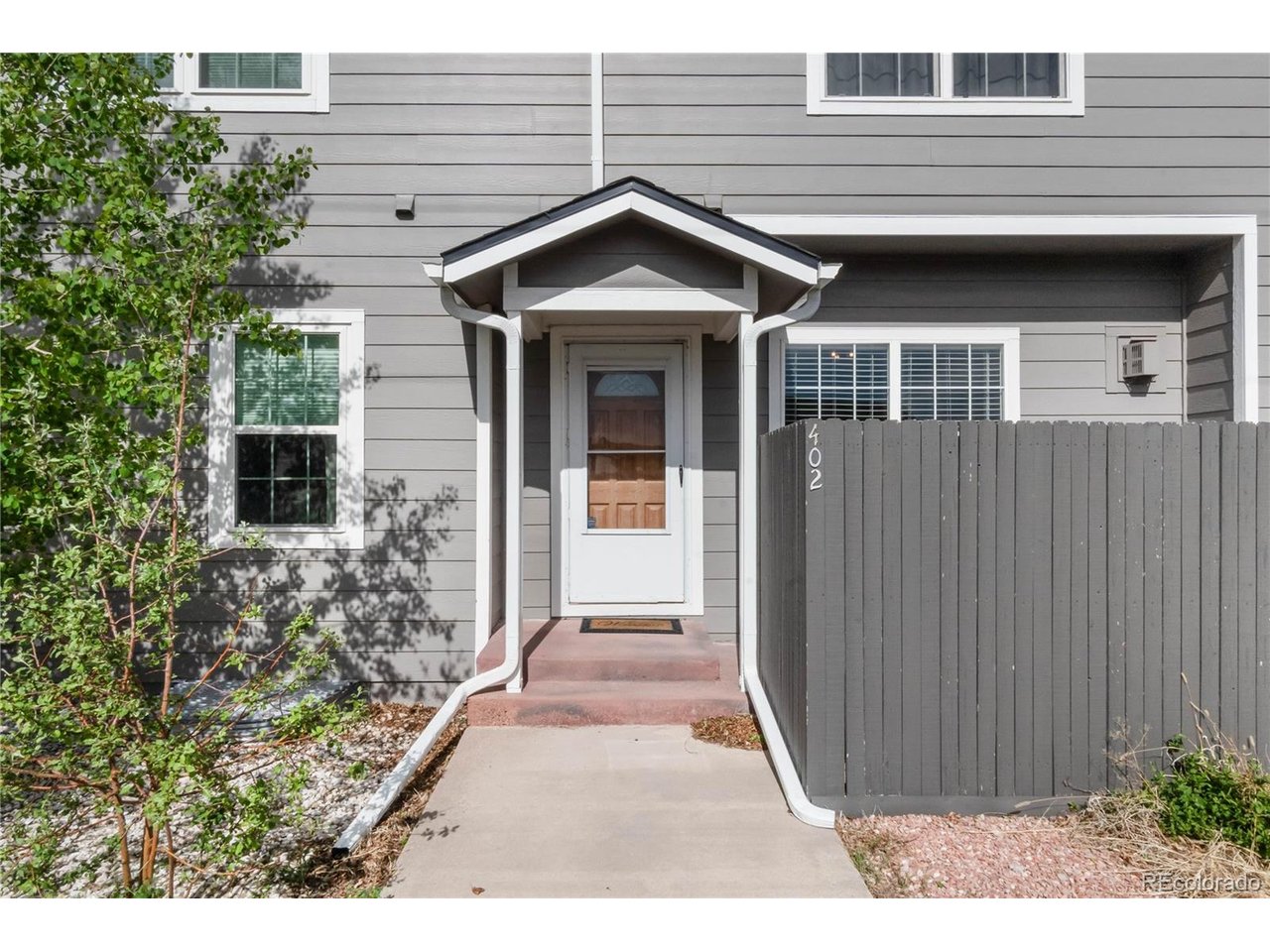 **ASSUMABLE 2.875% VA LOAN**Welcome to a rare opportunity in Kiowa, Colorado - a spacious 2-bedroom, 2-bath condo with a finished basement, private 2-car attached garage, rooftop patio, and an assumable 2.875% VA loan. Located just minutes from historic downtown Kiowa and just east of Elizabeth and Parker, this home offers small-town Colorado living with convenient access to nearby shopping, dining, schools, trails, and major commuter routes.Inside, this 1,370 sq. ft. condo features a functional multi-level layout with comfortable living spaces, updated bathrooms in the two upstairs bedrooms, new light fixtures, and an updated ceiling fan. The primary bedroom includes direct access to a private rooftop patio, creating a unique outdoor retreat that is perfect for morning coffee, evening sunsets, or extra entertaining space.The finished basement adds valuable flexibility and may offer potential for a future bathroom, guest space, home office, workout room, media room, or additional primary-style suite depending on the buyer's needs and plans. The attached 2-car garage provides private parking and extra storage - a major convenience for condo living in Kiowa.The HOA has recently completed major exterior improvements for the complex, including new roofs and fresh exterior paint, giving buyers added confidence and curb appeal. With its finished basement, rooftop patio, attached garage, updated interior touches, and low assumable VA loan rate, this Kiowa condo stands out as a smart option for buyers looking for more space, flexibility, and affordability east of the Denver metro.Enjoy the charm of historic downtown Kiowa, the open feel of Elbert County, and easy access to Elizabeth, Parker, and the surrounding southeast Colorado communities.