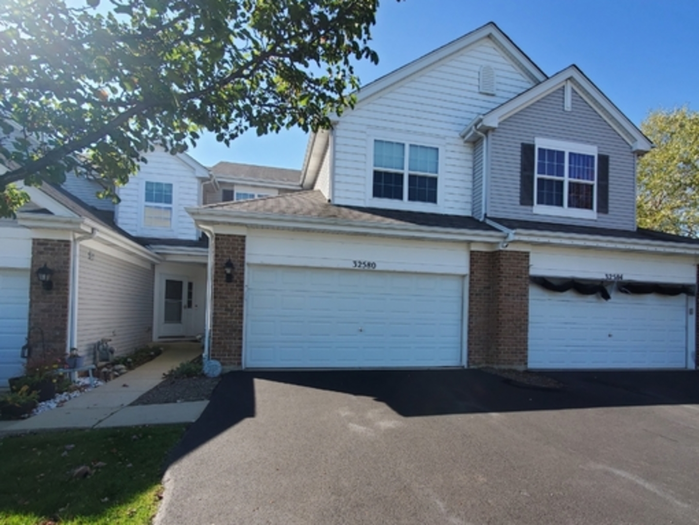 Location, Location, Location!  Very well kept, move in ready home just shy of 2000 Sq Ft of living space is nestled in  back in a private area with open space all around. This 2 Bedroom Townhome with a full garden style basement offers great additional space for your imagination ! Super open kitchen space along with an elegant dining area.  Slider doors lead  to the deck as well as a  large open private outside setting. The Living room has a cozy fireplace for those special nights and holidays.  The entire first floor is Open concept. The 2nd floor has 2 bedrooms and a warm loft.  This whole house lets in so much natural sunlight.  And an additional parking lot belonging to the homeowners which is  right next door so there is plenty of parking.