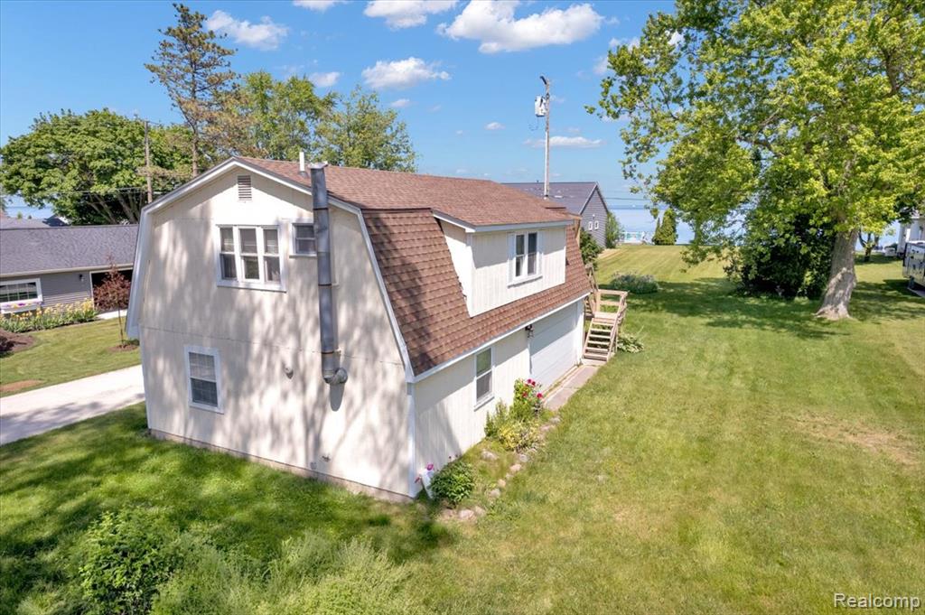 Welcome to your slice of waterfront paradise! Nestled right on the shores of the renowned Lake Huron, this rare lakefront gem offers breathtaking views, direct water access, and unbeatable potential. Whether you're looking for a relaxing vacation retreat, a full-time residence, or the ideal spot to build your dream home, this property delivers it all. 

Step outside and soak in the beauty of Michigan's Great Lake living from your very own private seawall, perfect for boating, fishing, or simply watching the sunset dance across the water. Inside, the home is move-in ready, thoughtfully maintained, and filled with charm. The spacious garage provides ample room for all your water toys, tools, and storage needs ideal for lake life.

The seller is generously including appliances and select furnishings, making your move seamless and stress-free. Whether you're entertaining on the lake or enjoying quiet mornings with a cup of coffee and an unmatched view, this property checks every box.

Don’t miss this opportunity to own a piece of prime Lake Huron shoreline where every day feels like a vacation.