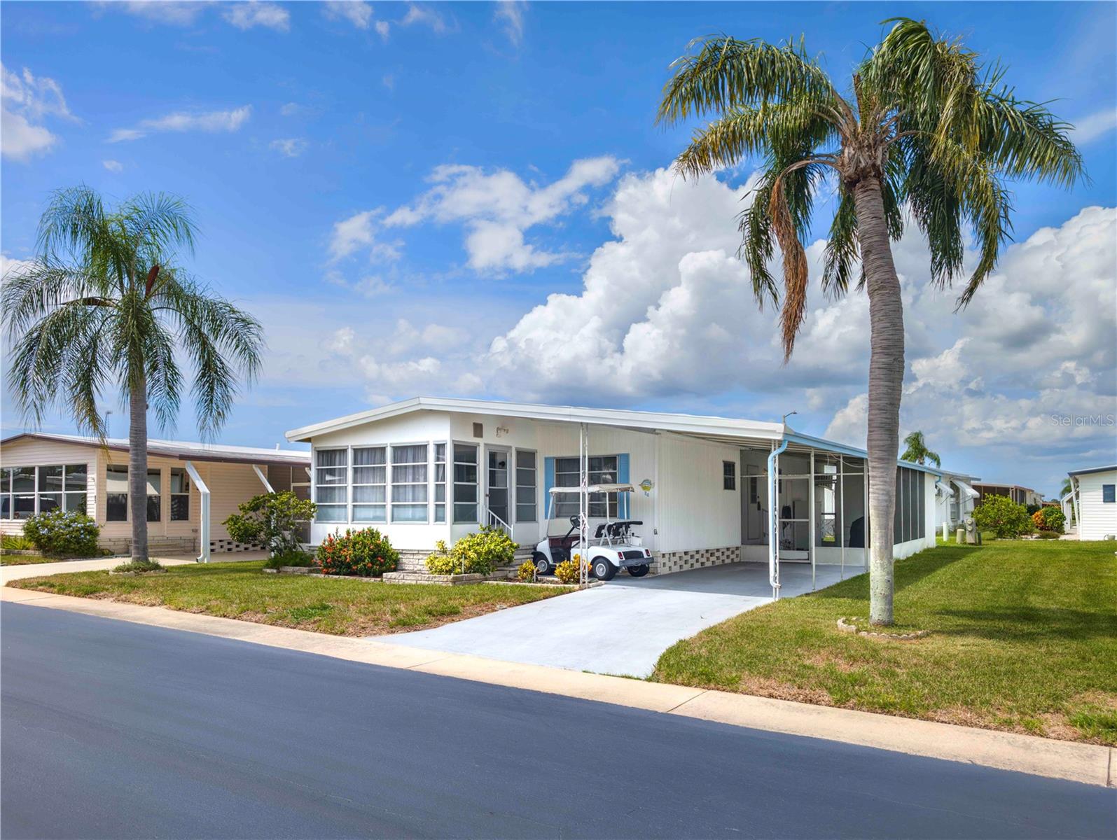 FLORIDA LIVING... Welcome to this charming 2-bedroom, 2-bathroom home located in the desirable, gated 55+ community of STONEHEDGE. NO FLOOD insurance needed. New roof 2021, new windows in bedrooms 2018, new updated kitchen and floors 2021, updated baths 2018!  ALL NEW PLUMGING 2021. AC New 2020 !!!! As you enter, you’ll be greeted by a generous living room that offers ample space for relaxation and entertaining. The kitchen features new cabinets, countertop, floors, appliances- and is seamlessly connected to the dining room in an open-plan layout, making it perfect for hosting family and friends. The dining room boasts built-in cabinets, adding both style and functionality. The home offers plenty of storage, with walk-in closets in both bedrooms. Enjoy the outdoors from the comfort of your covered side porch, ideal for sipping morning coffee or unwinding after a long day. The separate laundry room provides added convenience and storage. The Stonehedge on the Hill community has resort-style amenities: a heated pool, shuffleboard courts, game rooms, and clubhouse with sound system, 60” plasma TV, and a library. Residents enjoy regular social events and a monthly newsletter. A side gate to Mango Street provides quick access to Fred Howard Park Beach, Sunset Beach, Tarpon Springs Golf Course, and the historic Sponge Docks. Conveniently located near shopping, dining, and medical facilities—and just 22 miles to Tampa International and 18 miles to St. Pete/Clearwater Airport—this home offers the perfect combination of space, style, and location. Don’t miss your chance to own this updated double-wide gem in one of the area’s most welcoming 55+ communities. Schedule your private showing today! Available furnished.