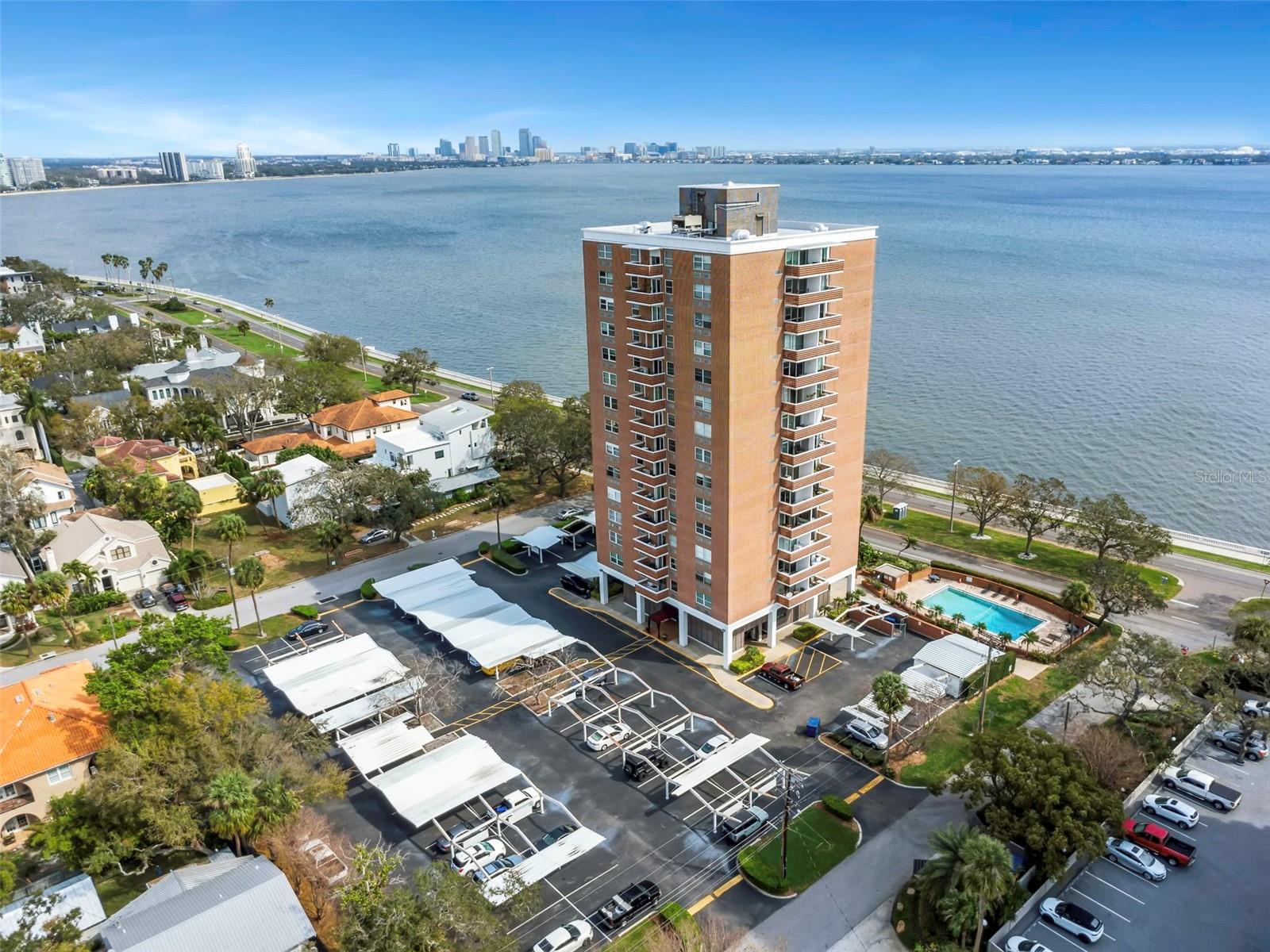 Imagine waking up to the gentle glow of the sun over Tampa Bay, and spending your evenings surrounded by the vibrant energy of the city. This exquisite property is on the 11th floor and offers the ultimate blend of urban sophistication and waterfront serenity, with expansive views of the bay and the city from your private balcony. Bayshore Boulevard, with its rich history and charm, is right at your doorstep to some of Tampa's best restaurants, nightlife, and cultural attractions. This is a rare opportunity to experience the best of city living, with the added luxury of breathtaking waterfront views. If you're drawn to the excitement and convenience of urban living, paired with the tranquility of a waterfront setting, this property is sure to captivate you!!  Relax and unwind at the pool or enjoy peace of mind with a secure lobby entrance and assigned parking.  Fitness fanatic, the gym is calling your name. Explore all South Tampa has to offer at Curtis Hixon Waterfront Park, Ybor City, University of Tampa, Amalie Arena, Channelside, SOHO, Seminole Heights, Davis Island, Harbour Island and so much more!  See it... Fall in Love... Make it Your Own!!!