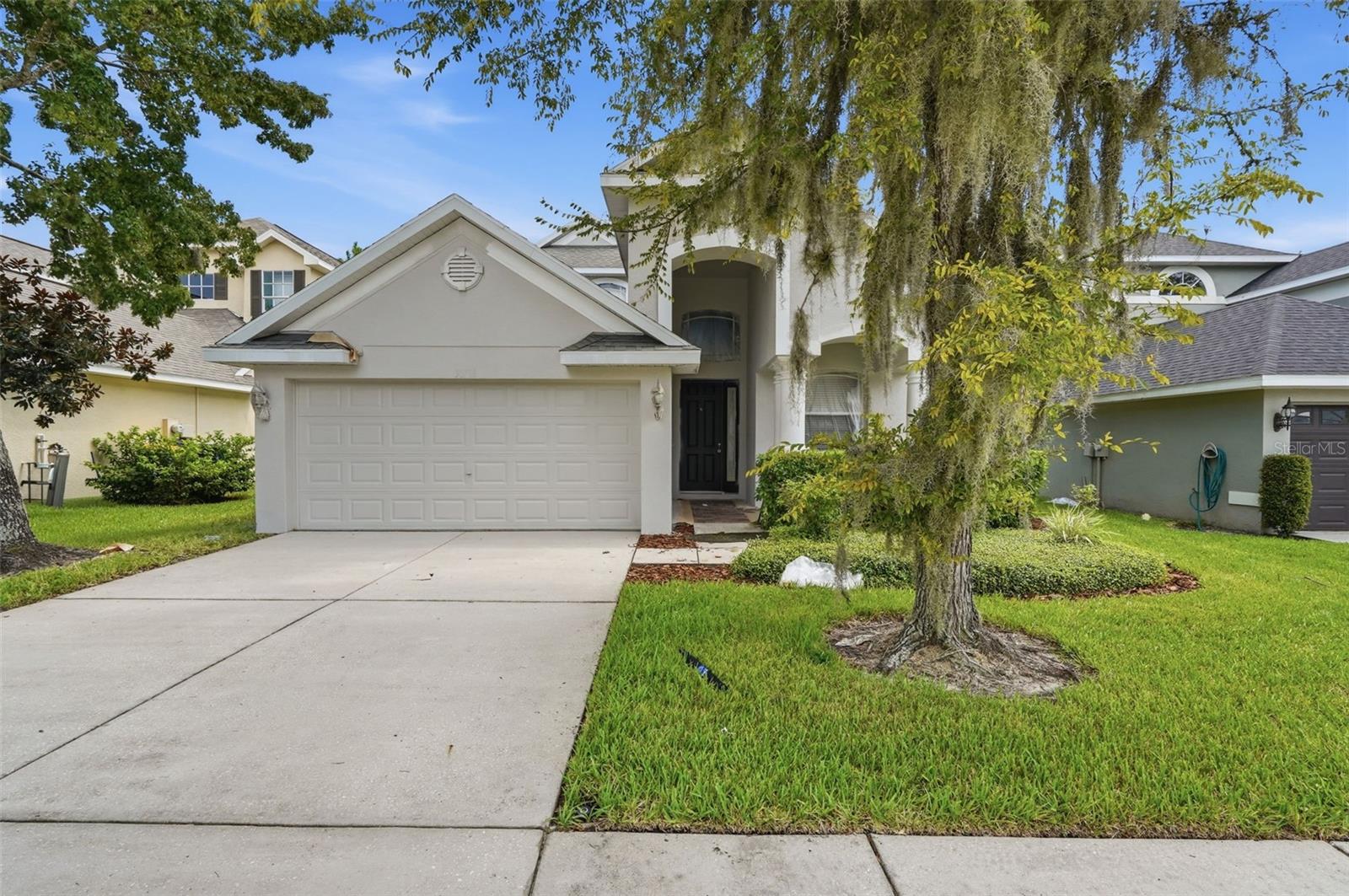 Virtually Staged. Welcome to this spacious two-story home in the desirable Country Walk community of Wesley Chapel. Offering three bedrooms, two and a half bathrooms, and over 2,300 square feet of living space, this home features an open and functional layout designed for comfortable everyday living. The kitchen provides ample cabinet and counter space and opens to the main living areas, making it ideal for entertaining or spending time with family and friends. Upstairs, all bedrooms are thoughtfully situated on the same level, including a generous primary suite with room to unwind. Enjoy the covered patio and private backyard, along with convenient access to shopping, dining, parks, schools, and major roadways for an easy commute.
