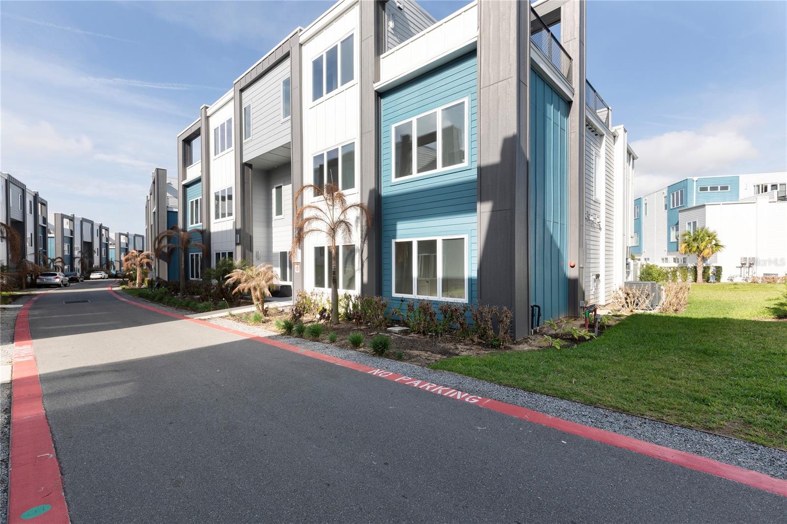 Step into this beautifully designed 3-bedroom, 2+ bathroom residence offering a perfect blend of modern style, functionality, and low-maintenance living.From the moment you enter, you’re welcomed by an expansive open-concept layout filled with natural light, sleek tile flooring, and clean contemporary lines throughout. The spacious living and dining areas flow seamlessly into a stunning chef-inspired kitchen, featuring a large quartz island, flat-panel cabinetry, stainless steel appliances, and elegant pendant lighting—perfect for entertaining or everyday living.The primary suite offers a peaceful retreat with generous space, plush carpeting, abundant natural light, and a spa-like ensuite bathroom complete with dual vanities, oversized mirrors, and a glass-enclosed walk-in shower.Two additional bedrooms provide flexibility for guests, family, or a home office, all designed with comfort and simplicity in mind.Step outside to your private, fully fenced patio with premium paver flooring—ideal for outdoor dining, relaxing, or entertaining guests in a low-maintenance setting.Additional highlights include:Bright, open-concept floor planModern neutral color palette throughoutHigh ceilings and recessed lightingEnergy-efficient featuresDedicated laundry spaceAmple storage and clean, minimalist finishesLocated in a beautifully maintained community with contemporary architecture and convenient access to shopping, dining, and major roadways, this home offers both style and convenience.