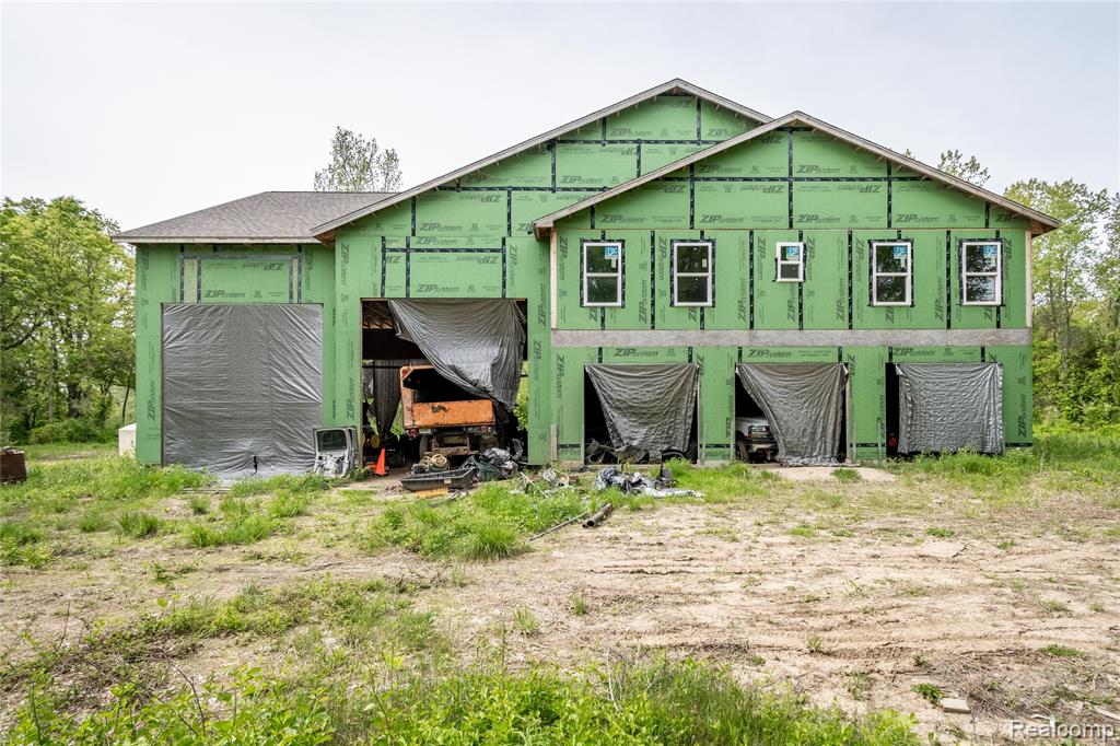 Take a look at this wonderful opportunity to create your dream home! Situated on nearly 20 acres of picturesque land, this property offers breathtaking views of a large pond, perfect for summer evenings of relaxation and tranquility. Whether you're enjoying the serenity of the water or exploring the vast open space, this property promises a peaceful retreat. The home itself is ready for your vision, providing the perfect canvas to design and complete according to your personal style and desires. With ample space, you can customize every detail to suit your needs, whether it’s creating a gourmet kitchen, luxurious bedrooms, or expansive living areas for entertaining. Don’t miss this rare chance to make this property your own. Schedule a tour today and start imagining the life you can create here!