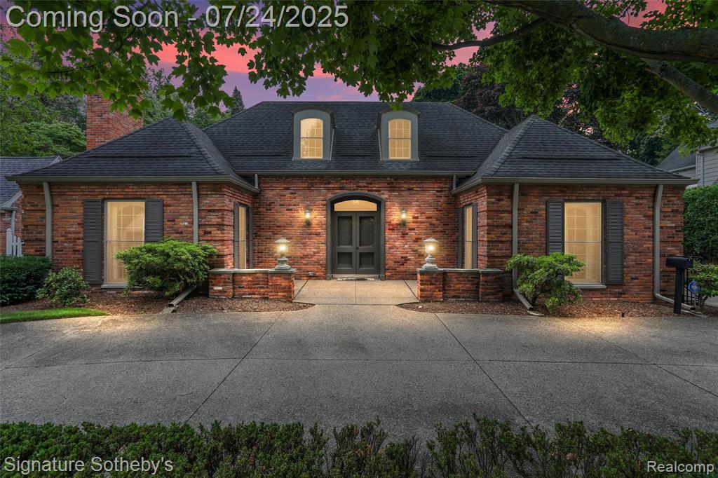 A must see custom built home in Grosse Pointe Farms designed by Robert Wood.  This charming home is great for entertaining & modern living.  The large first floor primary bedroom suite with 4 piece bathroom & large walk in closet is truly impressive. Stately Nine foot ceiling throughout the first floor gives this home an understated elegance.  The large kitchen backs up to a comfortable family room with a door-wall out to the back patio.  Both second floor bedrooms have en-suite baths. Impressive amount of closet space and storage throughout the house.  The main 3 car garage is flanked by a second 2 car garage great for car enthusiasts.   Close to the residents only lakefront Pier Park, Country Club of Detroit & the rest of Grosse Pointe attractions makes this home a must see.