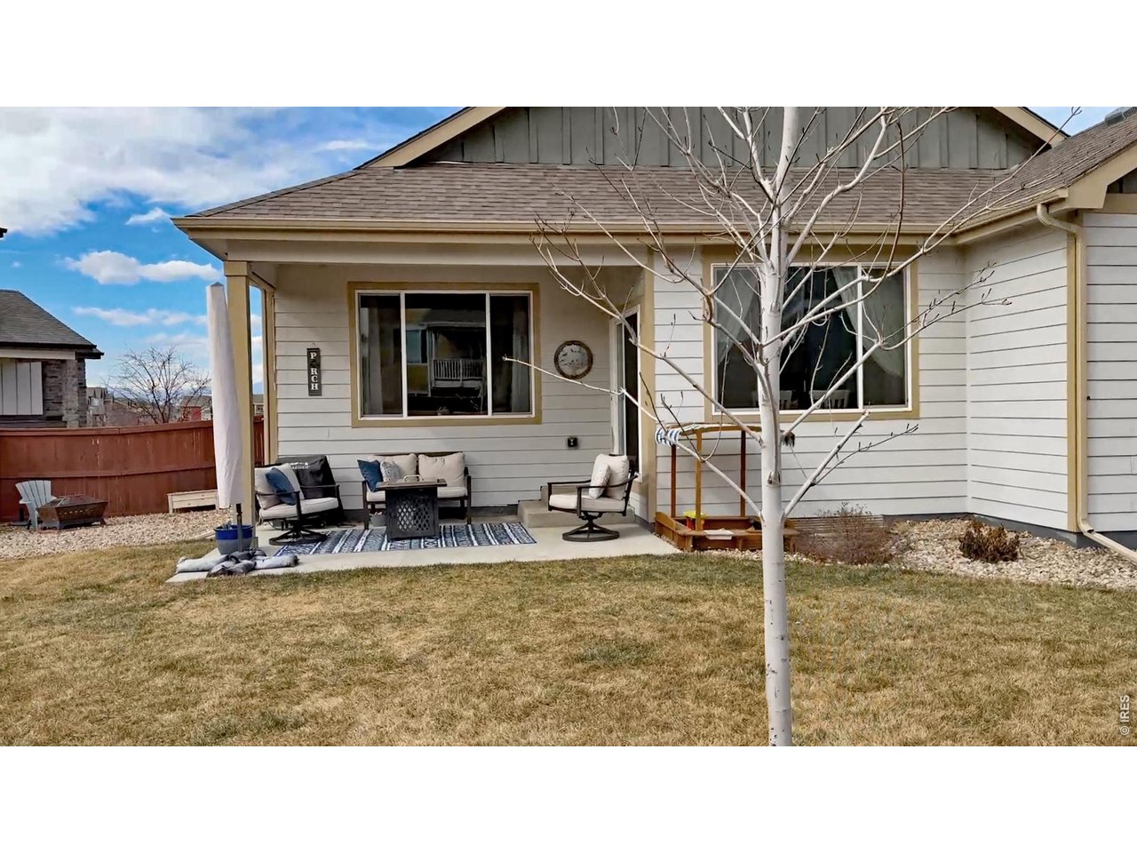Discover comfortable, low-maintenance living in the charming Raindance neighborhood! This charming 2020-built ranch-style home sits on a spacious lot and offers approximately 3108 Total Sq Ft (1,554 sq. ft. finished on the main level), with 3 bedrooms and 2 bathrooms. Ideal for those seeking single-level living with excellent expansion potential in the unfinished basement. Step inside to an inviting open floor plan featuring soaring ceilings and large windows that flood the home with natural light. The heart of the home is the gourmet kitchen, complete with alder wood cabinets, wide-plank wood flooring, and a large center island that seamlessly flows into the great room-style living area-perfect for everyday living and entertaining. The dining space flows beautifully into the living area that overlooks the backyard. The primary suite is tucked at the rear of the home for privacy, boasting a luxurious 4-piece bath with a walk-in shower, double sinks, and a spacious walk-in closet. Two additional bedrooms at the front share a full bath, and a convenient main-floor laundry room completes the thoughtful layout. Hardwood flooring throughout the entry, kitchen, and dining areas adds warmth and cohesion. Downstairs, the unfinished basement offers excellent expansion potential and generous storage. With central air conditioning, forced-air natural gas heat, and a 2-car attached garage, this home is move-in ready. Outside, enjoy the fully landscaped and fenced yard and a covered back patio. The home features durable cement siding, stone accents, and quality frame construction built to last. Whether you're looking for a turnkey home to enjoy immediately or a fantastic opportunity to customize and nearly double your living space, this home offers comfort, style, and outstanding value. Schedule your private tour today!
