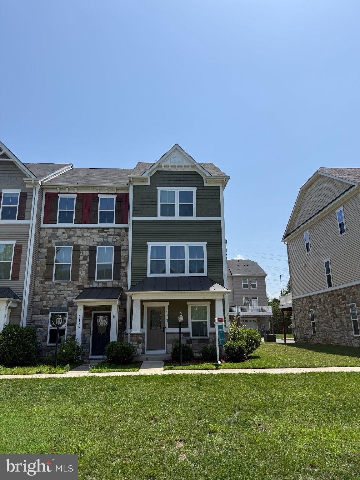 Welcome home to this beautifully maintained end-unit townhome in the sought-after Westridge community! Sunlight pours through extra end-unit windows, spilling across rich hardwood floors and an open-concept main level made for both quiet evenings and easy entertaining. The gourmet kitchen is the heart of it all — granite countertops, stainless steel appliances, and a layout that flows right out to your deck, perfect for morning coffee or weekend grilling.Upstairs, the primary suite offers a true retreat with its own full bath, while a versatile loft-level bedroom with a full bath and walk-in closet gives you flexible space for guests, a home office, or whatever life calls for next. With four finished levels, there's room to spread out, and the oversized one-car garage means storage is never a struggle.And here's the bonus most buyers don't realize: unlike some townhomes in the area that sit under a condo association (meaning a separate condo fee stacked on top of HOA dues), this home is true fee-simple ownership under a single HOA — so you get all the same resort-style perks without paying twice for them.Beyond your front door, Westridge delivers a clubhouse with pool and fitness center, tennis courts, walking trails, tot lots, and ponds, all just minutes from shopping, dining, and major commuter routes.This one has the space, the finishes, and the location. Come see it for yourself!