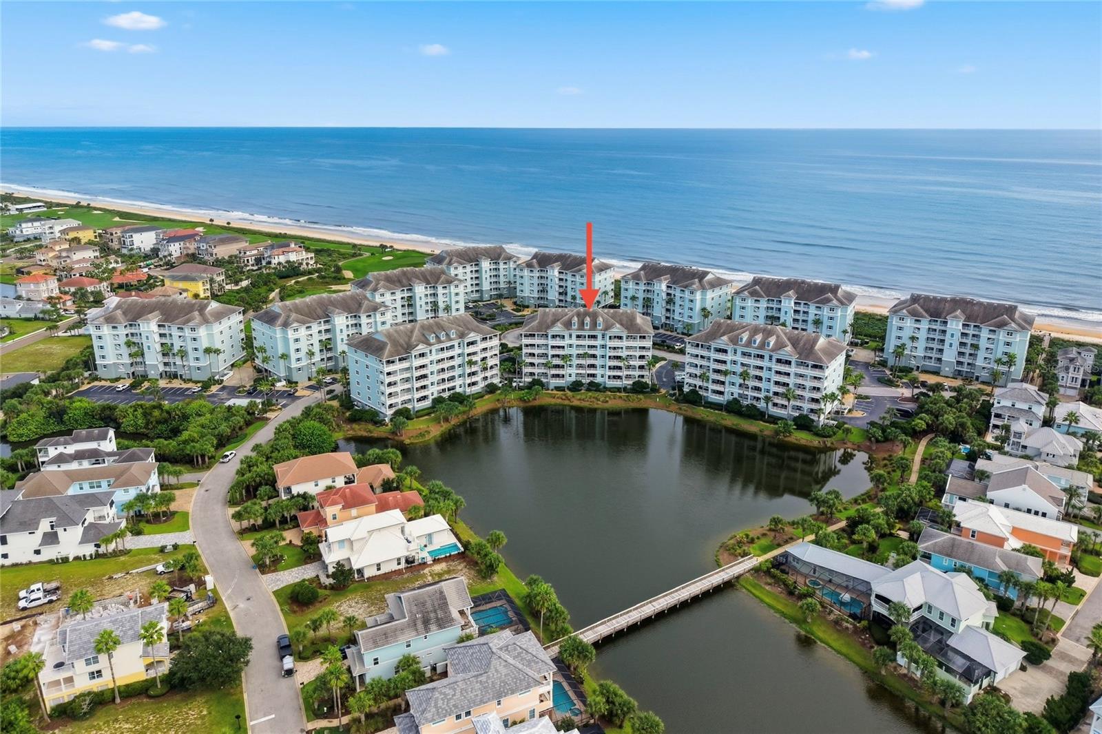 Welcome to this stunning, fully furnished, turnkey condo located in the exclusive gated Cinnamon Beach community! This 1,344 SqFt, 3 bedroom, 2 bath condo is located on the third floor with a large covered balcony and sunset lake views, perfect for morning coffee, evening dining, or just taking in the breathtaking surroundings. Even better, private beach access and resort style amenities are just a few steps away! This property is the perfect primary residence, coastal getaway, or income property. The inviting floor plan of this unit connects the kitchen, dining, and living areas into one cohesive space. With ceramic tile flooring throughout the main living area and primary bedroom, cleaning up is a breeze! The sliding glass doors off the living area bring the beautiful lake views right inside. The kitchen features sleek granite countertops, a breakfast bar, a full pantry, and abundant cabinetry for all your kitchen essentials. The primary suite offers an ensuite bath with dual sinks, a soaking tub, and a separate walk-in shower. Coastal furnishings throughout create an elevated yet relaxed atmosphere.Recent updates include a stainless-steel refrigerator and dishwasher, oven heating element, washer and dryer, and storm windows. This unit has been well maintained, with the A/C replaced in 2024 as well as the hot water heater in 2021. Currently utilized as an income producing short term vacation rental with a strong rental history and all 5-star reviews, this condo comes complete with anything you could want, from boogie boards to silverware and everything else in between! This unit comfortably sleeps 8, including a leather sleeper sofa with a new mattress and added supports for extra sleeping flexibility. Nearby beaches, golf courses, dining, shopping, state parks, and bike trails provide plenty to explore in Palm Coast and Flagler Beach, with St. Augustine and Daytona just a short drive away. Cinnamon Beach offers resort style amenities in addition to private beach access. Enjoy the quiet, oceanfront pool or spend the afternoon at the lakefront zero entry pool and splash garden. Additional amenities include a Jacuzzi spa, fitness center, gaming and media area with a distinct children’s zone and separate adult lounge, business center, and seasonal dining at the Cinnamon Beach Grille. Each unit gets one designated parking space in the under-building garage with elevator access, adding everyday convenience. Who says you can’t have it all? With turnkey convenience, sunset lake views, steps from private beach access, and exceptional value in an exclusive and private community, this condo truly has it all! Schedule your private showing today and make this Cinnamon Beach retreat your own!