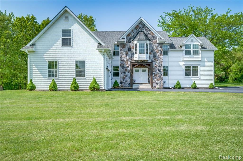 BRING US AN OFFER- SELLER IS MOTIVATED! AS NEVER  BEFORE  SEEN...CHECK OUT THESE  PHOTOS!  Finely built destination home on 6 Gorgeous private acres flowing with fruit  and  black wall nut trees, wild flowers and mature hedges the forest creatures love! —meticulously maintained from corner to corner! Designed for friendly gatherings and family fun, this home has everything you're looking for and more. Nestled in one of North Oakland’s most beautiful areas, it offers the best of all worlds: charming downtowns, upscale restaurants, golf courses, and major shopping—all just minutes away. The open floor plan showcases hardwood floors, two fireplaces in the great room and dining area, and a magazine-worthy kitchen. Every window offers a stunning view. Enjoy your morning coffee or evening wildlife sightings from the walk-out all-season cedar room with a natural hearth, leading to a spacious deck overlooking lush woods wired for sound for your listening pleasure!  Retreat to the enormous primary suite featuring a spa-like bath, his-and-hers dressing areas, and a cozy nook perfect for relaxing. The gourmet kitchen includes double ovens and double refrigerators,  and the longest butcher block counter ever overlooking  dining area that opens to the family room and fireplace—ideal for entertaining. Upstairs bonus room includes a closet, alcove, and full bath—perfect for guests, a home gym, office, or anything you can imagine. The finished lower level is ready for a bar, home theater, or additional bath—endless possibilities await! Truly pristine and move-in ready. Award-winning schools. All information is not guaranteed and should be independently verified by the purchaser. Call for details now it won't last long!