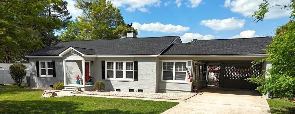 Discover refined comfort and effortless entertaining in this immaculate residence offering over 2,144 square feet of beautifully maintained living space. This classy home blends timeless style with exceptional updates throughout. Step inside to find rich hardwood flooring throughout, spacious walk-in closets in every bedroom. The thoughtful layout includes two Owner's Suites, ideal for multi-generational living or hosting long-term guests. The inviting living room features a cozy fireplace, while the expansive family den overlooks your private backyard retreat & inground pool. Designed for entertaining, the outdoor space is truly a showpiece. Enjoy the in-ground pool surrounded by extensive, gorgeous, stacked stone landscaping and professionally manicured grounds. A spectacular wrought iron gate, welcome you into this backyard paradise, fully enclosed with a vinyl privacy fence for ultimate seclusion. Updated Windows throughout! The brand-new Roof was installed in 2025, & a 20-year pool liner was replaced in 2024, complete exterior trim paint in 2025, offering peace of mind for years to come. Every detail reflects pride of ownership and meticulous care. This is more than a home — it's an easy escape. Come & experience this entertainer's dream for yourself. Click here for virtual tour: https://my.matterport.com/show/?m=q28kJBYu3EY&mls=1