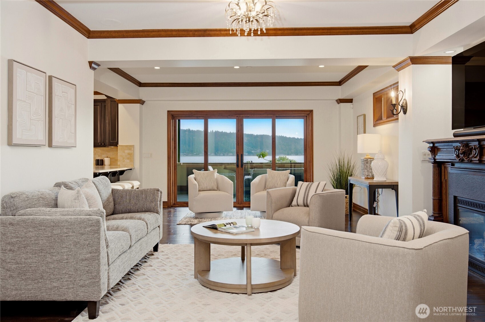 Open concept great room with panoramic Lake Sammamish views and seamless indoor-outdoor waterfront living.