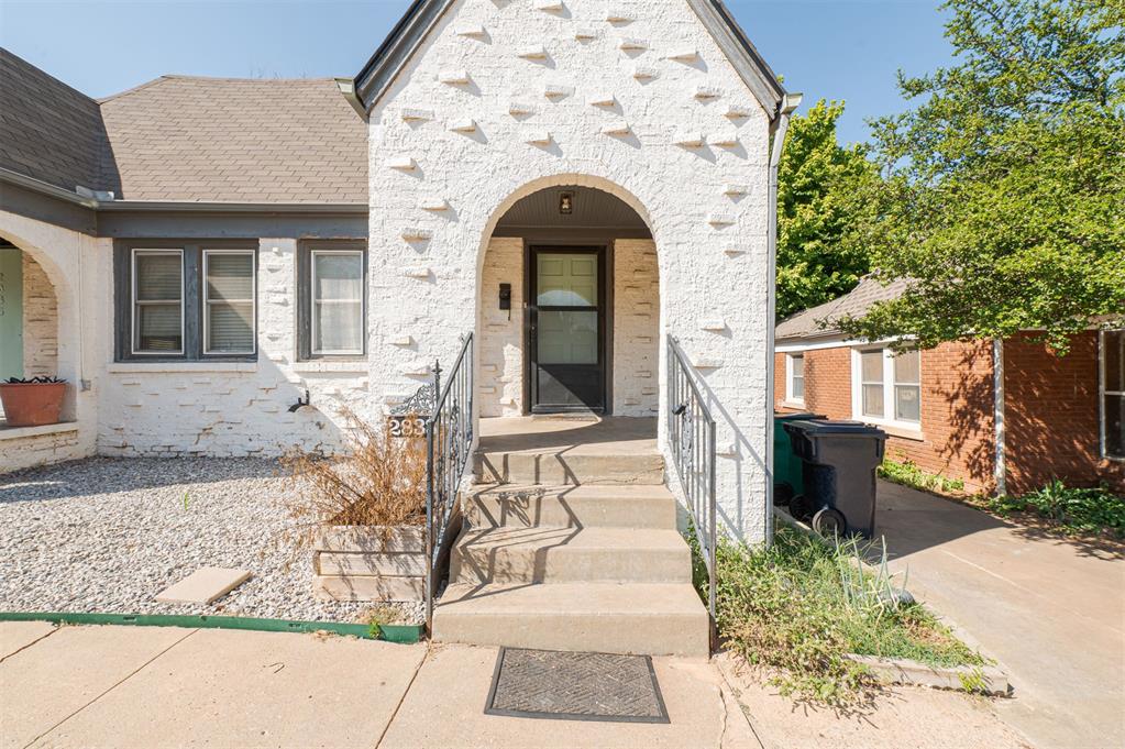 Available now!! Charming, light-filled historic duplex with 2 bedrooms and one bath features original fireplace and hardwood floors, built-ins and more! Washer and dryer are included as are water/trash service and lawn maintenance. Tenant responsible for gas and electric, pets welcome! Parking and storage space on property!