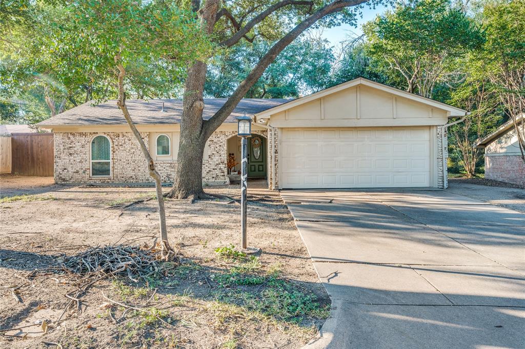 Charming farmhouse-style home in Fort Worth! 3 bedrooms, 1.5 bathrooms, and approximately 1,200 sqft of living space. Beautiful updates throughout, including rustic accents and stylish fixtures. HUGE shaded backyard with mature trees ideal for hosting and entertaining, perfect for outdoor recreation or relaxation. Many updates including BUTCHER BLOCK counters in kitchen, decorative plank ceiling, 2 tone cabinets, FARM sink & more. Prime location, convenient to local amenities, schools, and highways. Perfect for first-time buyers or those seeking a home under $300,000