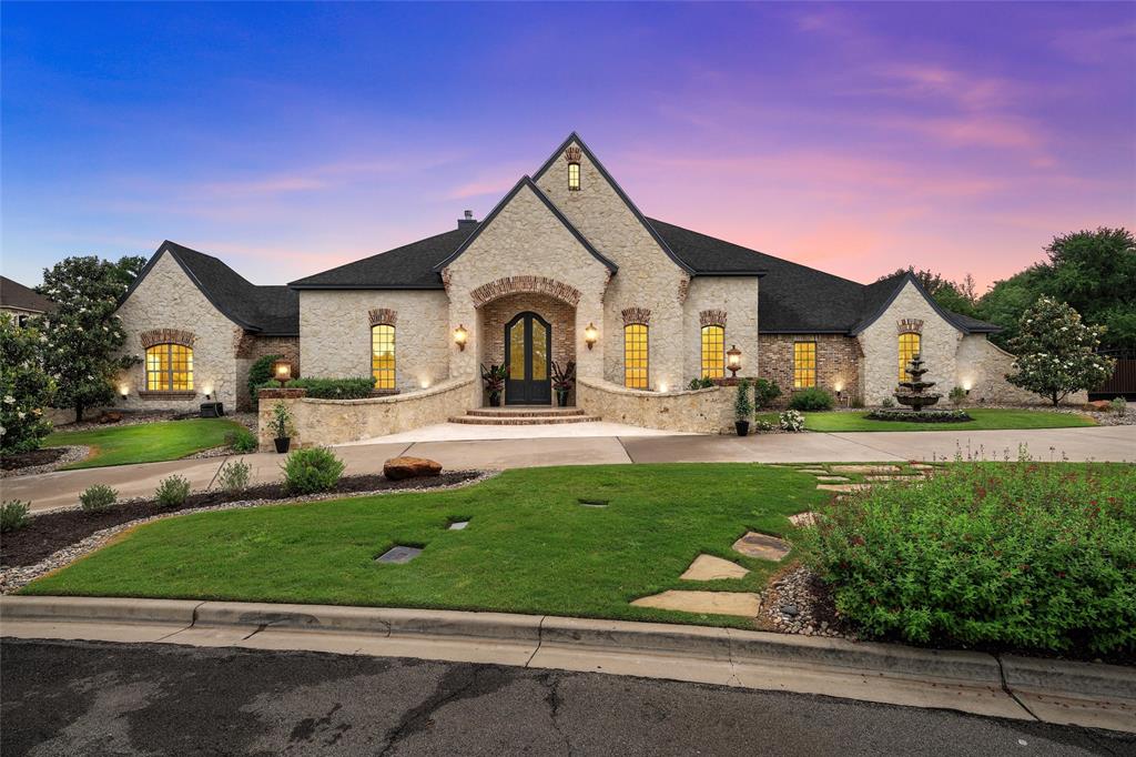 Experience timeless elegance and refined luxury in this custom designed 4 bedroom, 3.5 bath estate, nestled on a spacious large culdasac lot within the prestigious Hidden Valley community. This remarkable ONE STORY estate offers 8,138 square feet of meticulously crafted living space, artfully wrapped around a serene private backyard oasis. The home's stately authentic stone facade sets a tone of sophiscated charm, welcoming  you into a grand interior where quality and design converge. The heart of the home is the stunning main living area with a dramatic floor to ceiling  stone fireplace. The culinary dream kitchen is a chef's paradise, complete with top of the line appliances, sophiscated finishes, ensuring every meal from a family dinner or entertaining  an enjoyable experiencine.   The front-oriented  home office, features floor to ceiling wood cabinets, with a beautiful view outside. The primary master suite has two huge closets for abundent storage and a romantic fireplace.  Enter the en-suite with a huge travertine walk through shower, and soaking tub with jets.  Entertain in your formal dining room with elegant chandellier casting the perfect light for any occasion.  
Step outside to your private outdoor oasis which is nothing short of extroidinary.  Take a swim in your  sparkling pool and soothing hot tub—perfect for both relaxing evenings and lively weekend gatherings, with a half bath outiside. A massive circular driveway, gardens and fountain welcome you to the estate with  5 garages ideal for oversized vehicles, trucks, and boats and  side motor home parking with iron gates for extra security encompass this palacial estate.  A 500 lb propane tank makes heating your pool and gas appliances economical and convenient.
Entertain in your 677± square foot casita, which provides extra space for guests or multi-generational living including a kitchen, living area, bedroom, and bathroom.  This well thought out estate possesses grandour, quality, functionality.