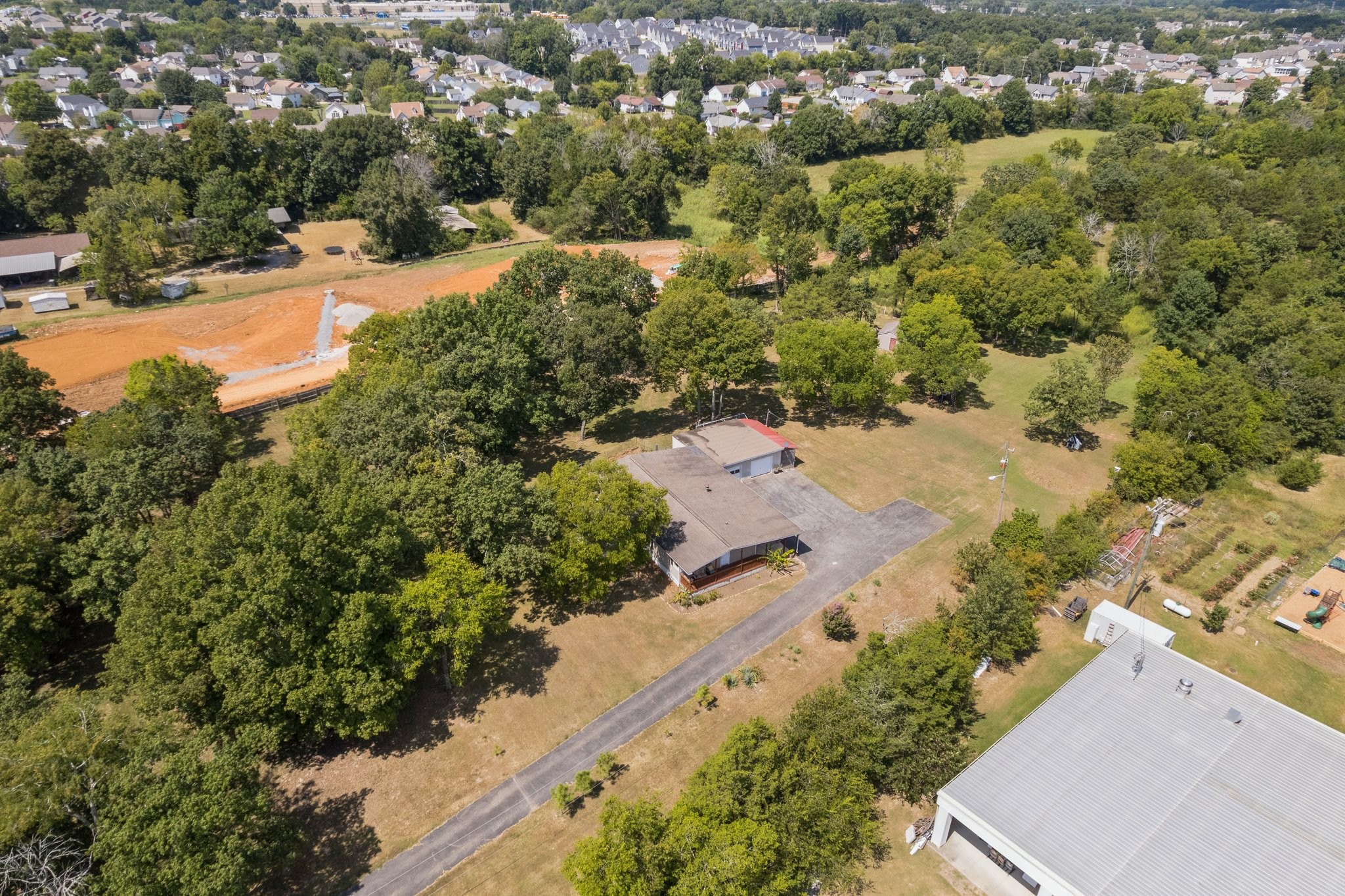 Rare 7.54-acre opportunity on Old Hickory Blvd in Antioch! Property features an existing 3-bedroom, 2-bath home, AR2A zoning, and public sewer already connected. Conveniently located approximately 15 miles from Downtown Nashville, with easy access to I-24, Percy Priest Lake, BNA, shopping, dining, and major developments. Surrounding properties along the corridor have seen rezoning and new residential/mixed-use development, making this a compelling opportunity for homeowners, investors, or builders to explore future subdivision or development potential. Buyer/agent to verify all zoning, uses, utilities, and development possibilities.
