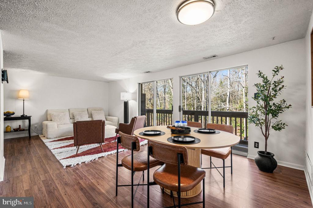 Discover serenity in Shannon Green with this stunning two-bedroom, one-bathroom condo, nestled within the desirable King's Grant community of Marlton. Enjoy a private balcony overlooking lush woods for peaceful mornings with coffee or evenings unwinding amid nature. Inside, the open layout shines with natural light, a convenient in-unit laundry, and modern finishes in the updated kitchen and cozy living spaces. Ample amount of storage include 2 closets in the master bedroom and a generous pantry in the kitchen. Additional outside storage unit.Residents love King's Grant's resort-like amenities: scenic lakes for fishing and kayaking, miles of wooded walking and biking trails, tennis and basketball courts, playgrounds, a dog park, community pool, beach area, clubhouse, and year-round events.  Links Golf Club for golf lovers! All this in a vibrant, nature-filled setting close to schools, shopping, and highways. This serene retreat won't last—schedule your showing today!